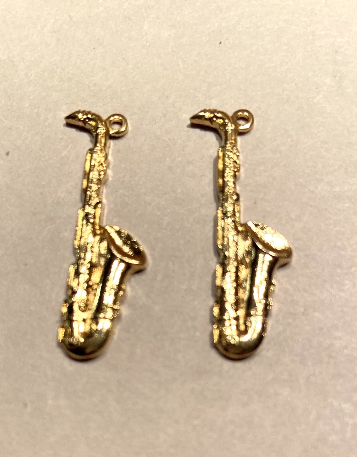 32x Gold Plate Charm with hole for hanging- Small saxophone shape, musical