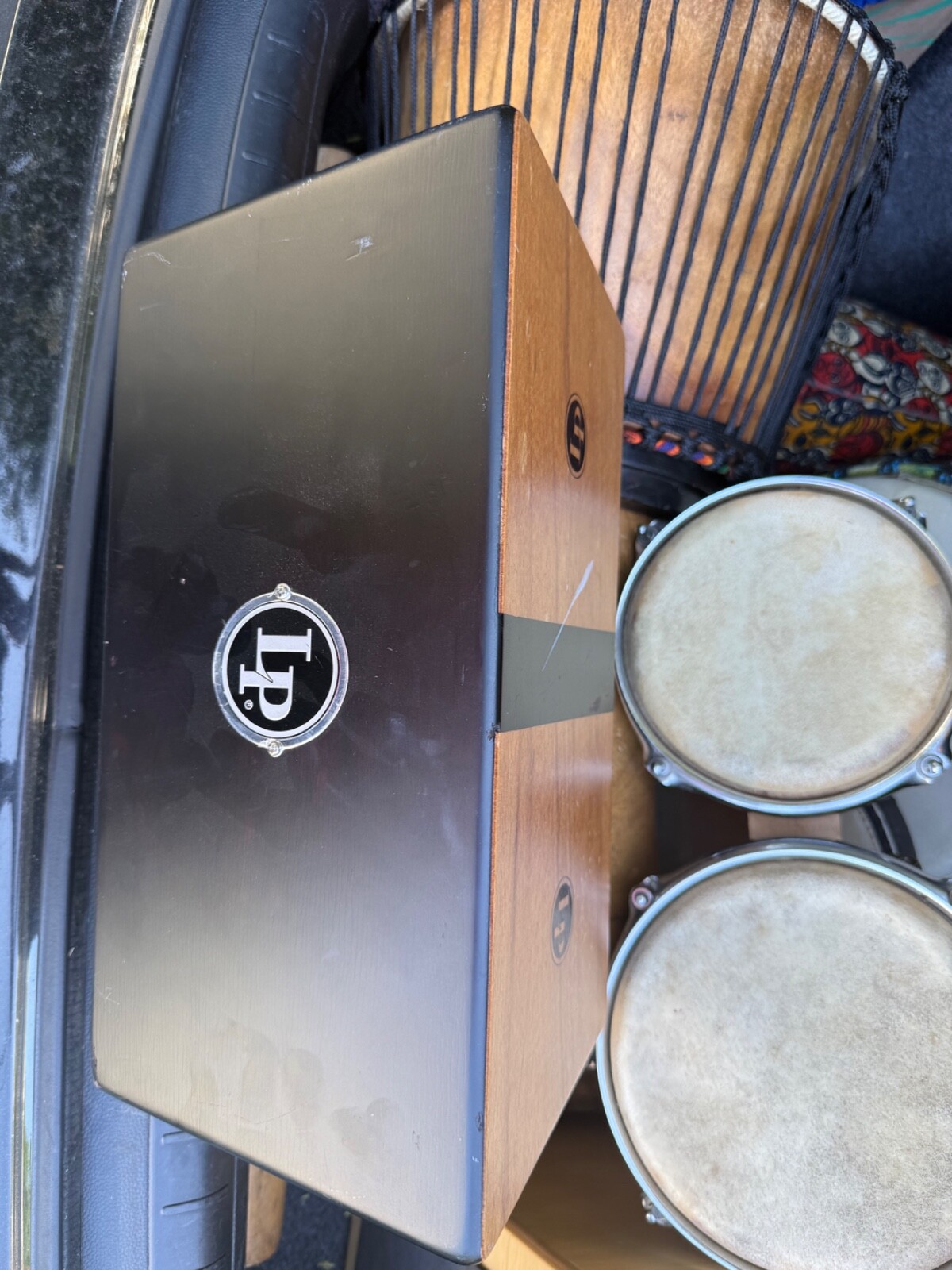 Percussion Instruments (Djembe, Cajon, Rain Sticks, Bongos)