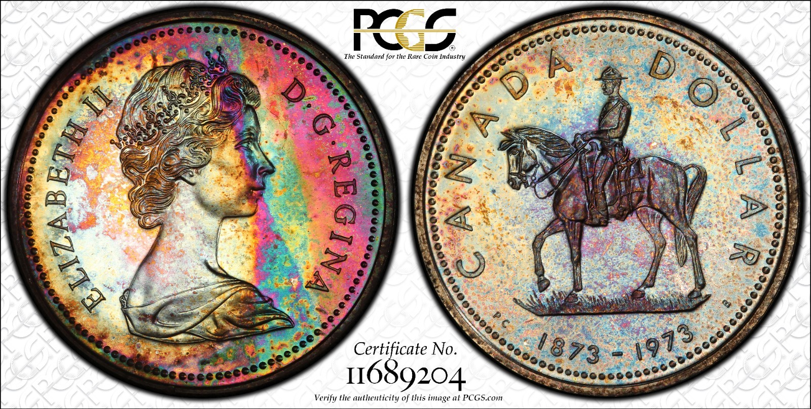 1973 $1🌈RAINBOW🌌PCGS SP-67🌈 MONSTER RAINBOW TONED R.C.M.P. COMMEM. DOLLAR🇨🇦