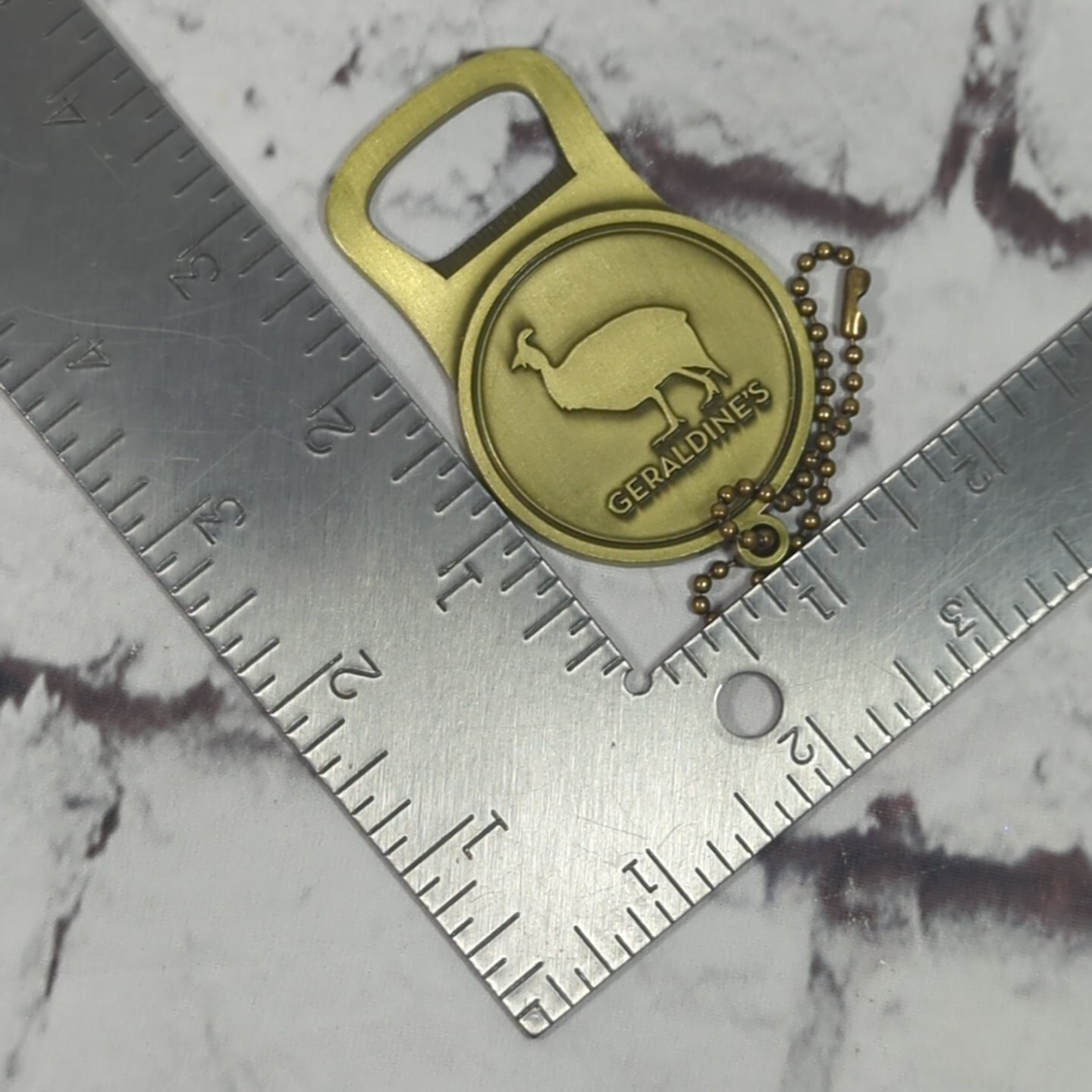 Geraldines Advertising Bottle Opener Keychain