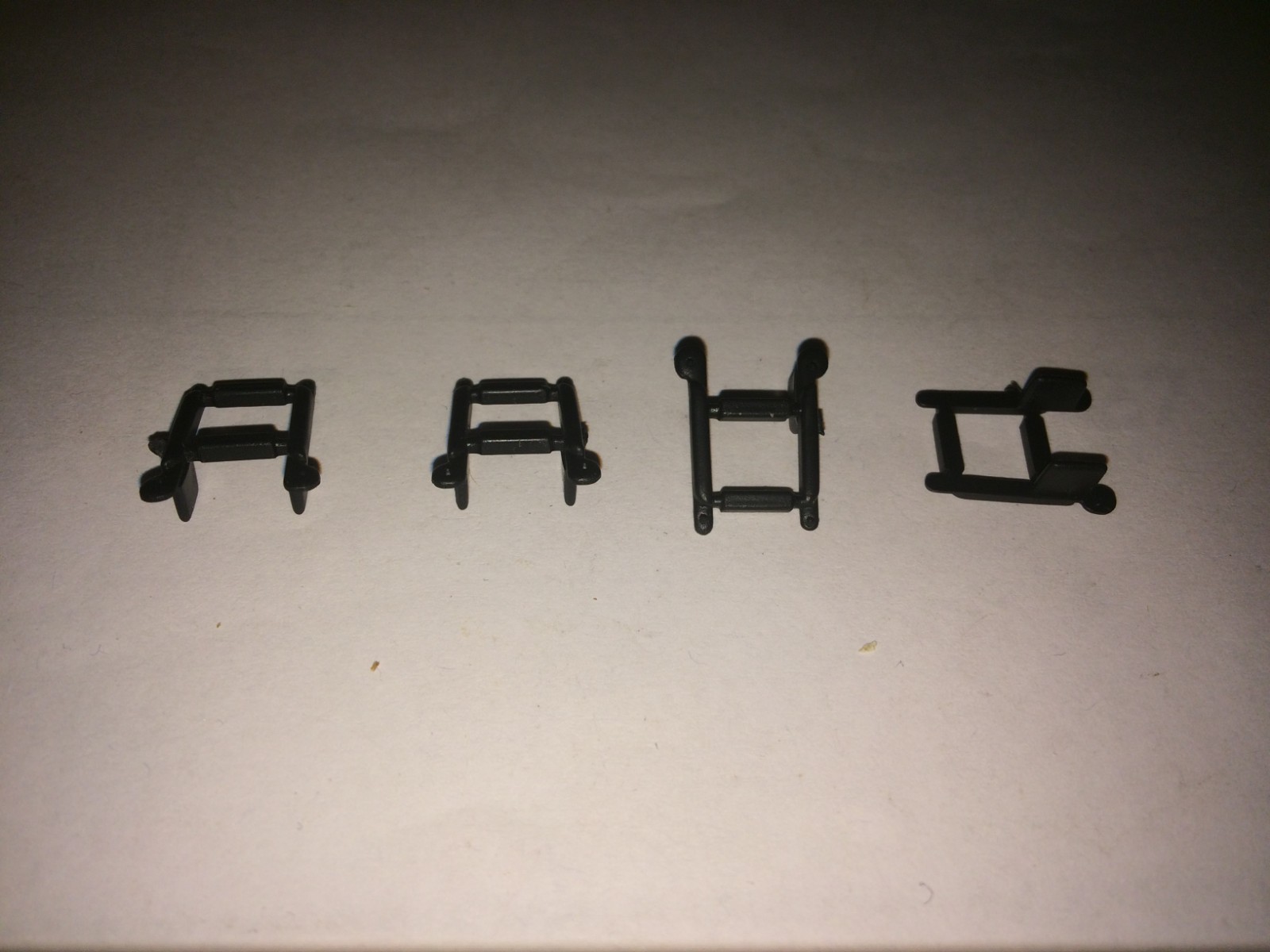 LIONEL PART 2333-15, SET OF 4 F-3 CAB DOOR STEPS  2343 ETC