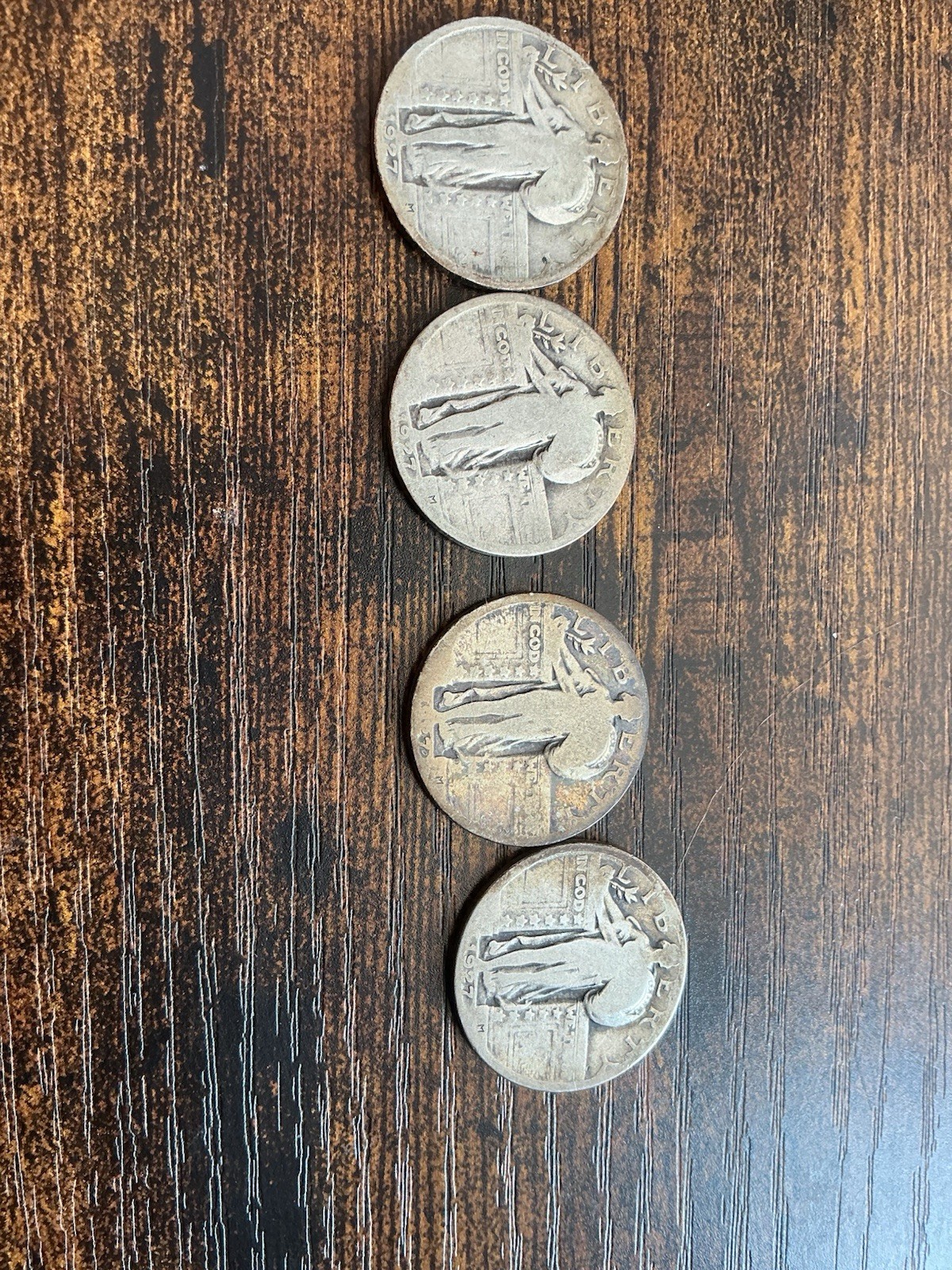 (4) 1927 Liberty Standing Quarters