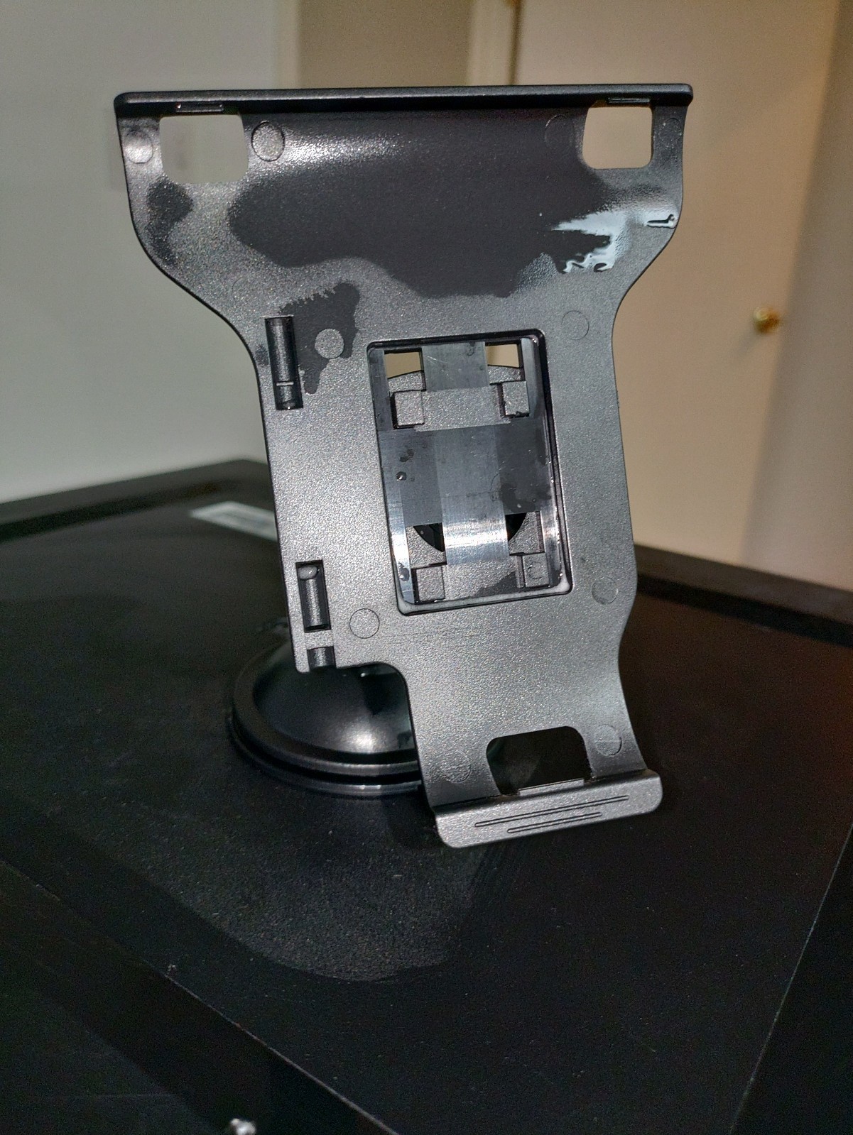 A Suction Cup Assembly for a {Rand McNally} [RoadExplorer 7] GPS Navigation Unit