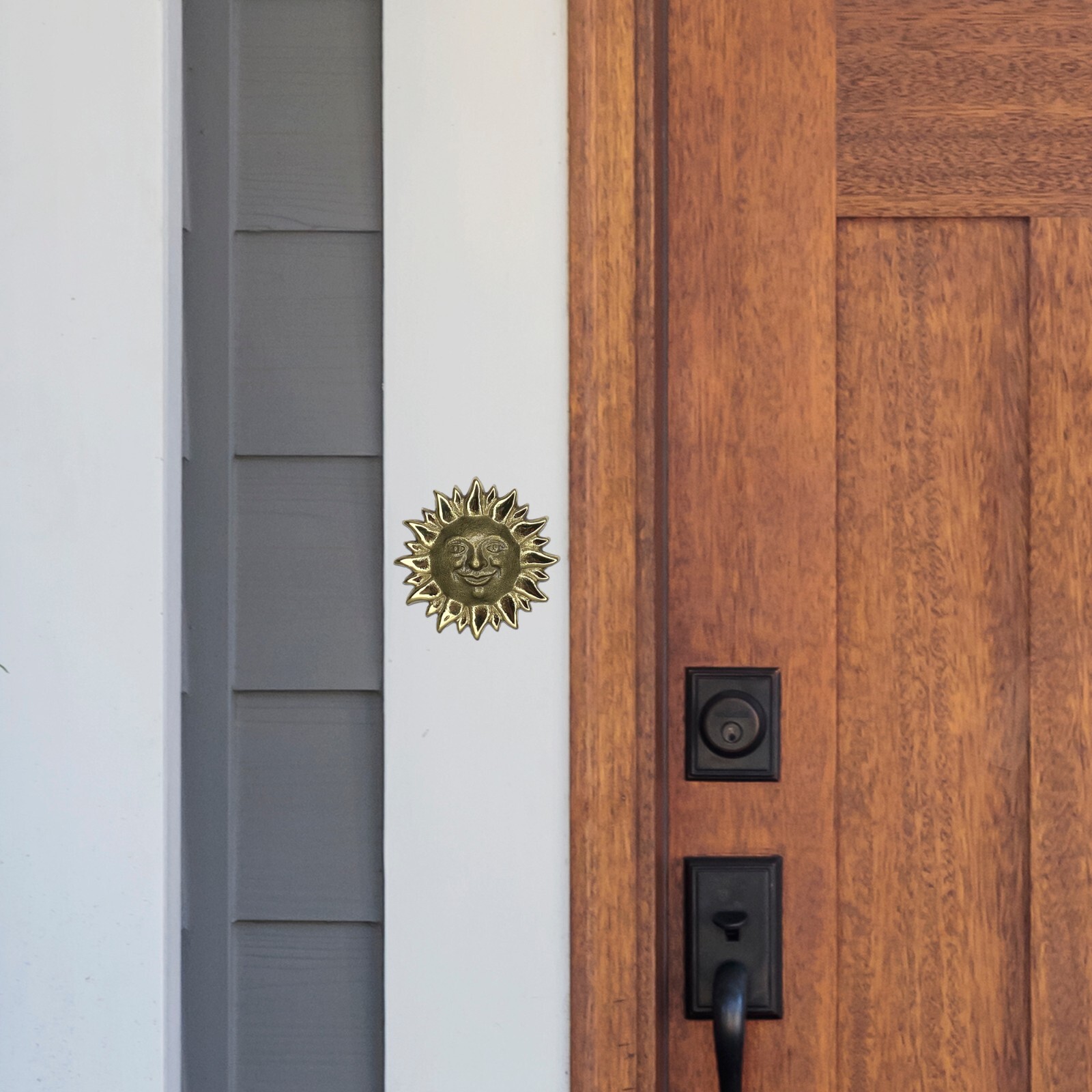 Sunface Doorbell Ringer by Michael Healy - Bronze Finish