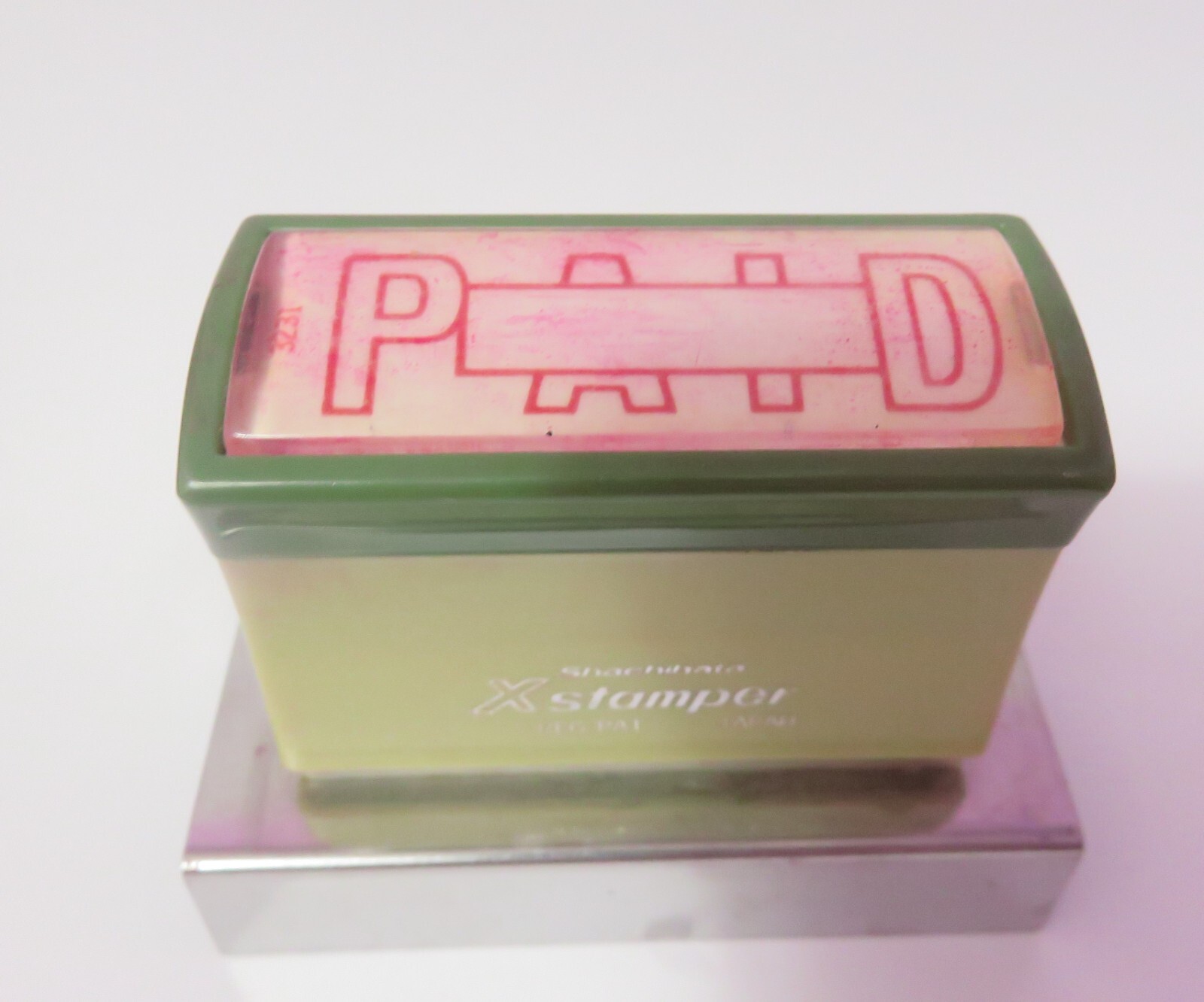 VINTAGE XSTAMPER POSTAL STAMPER PAID