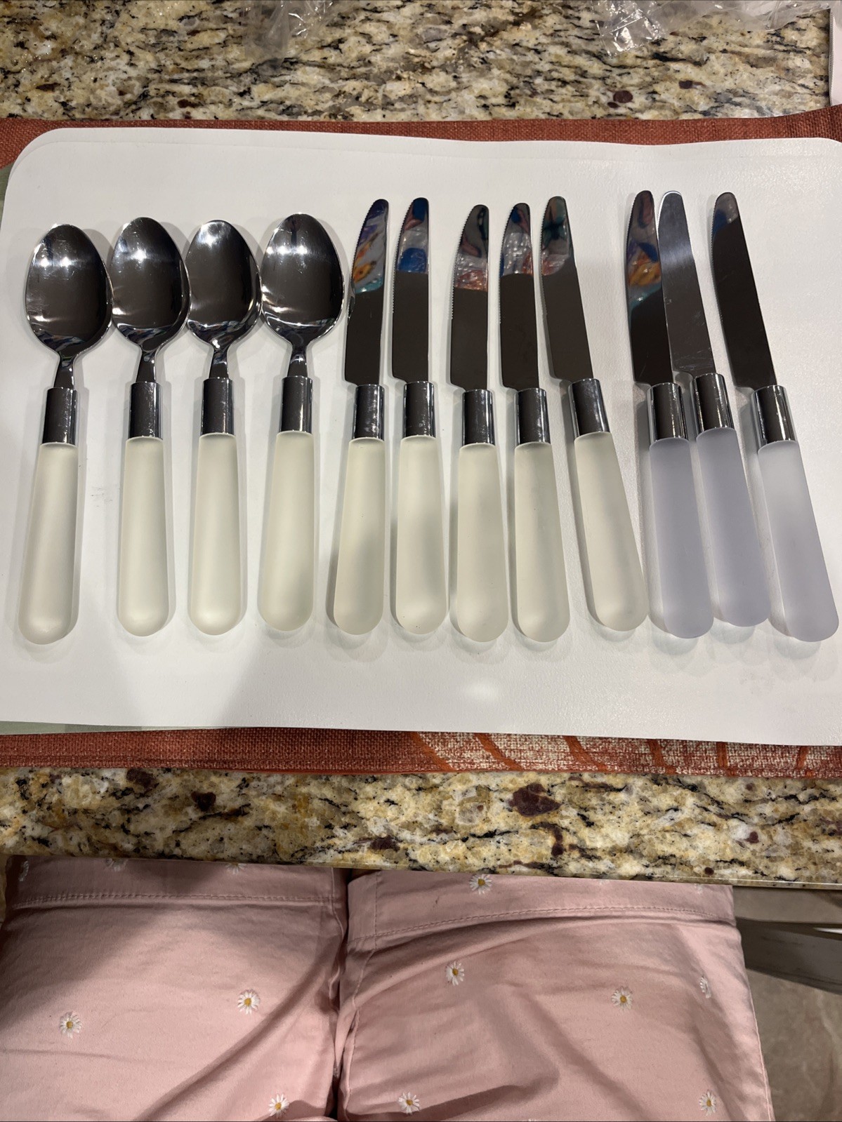 Vintage knives clear handle and four spoons clear handle