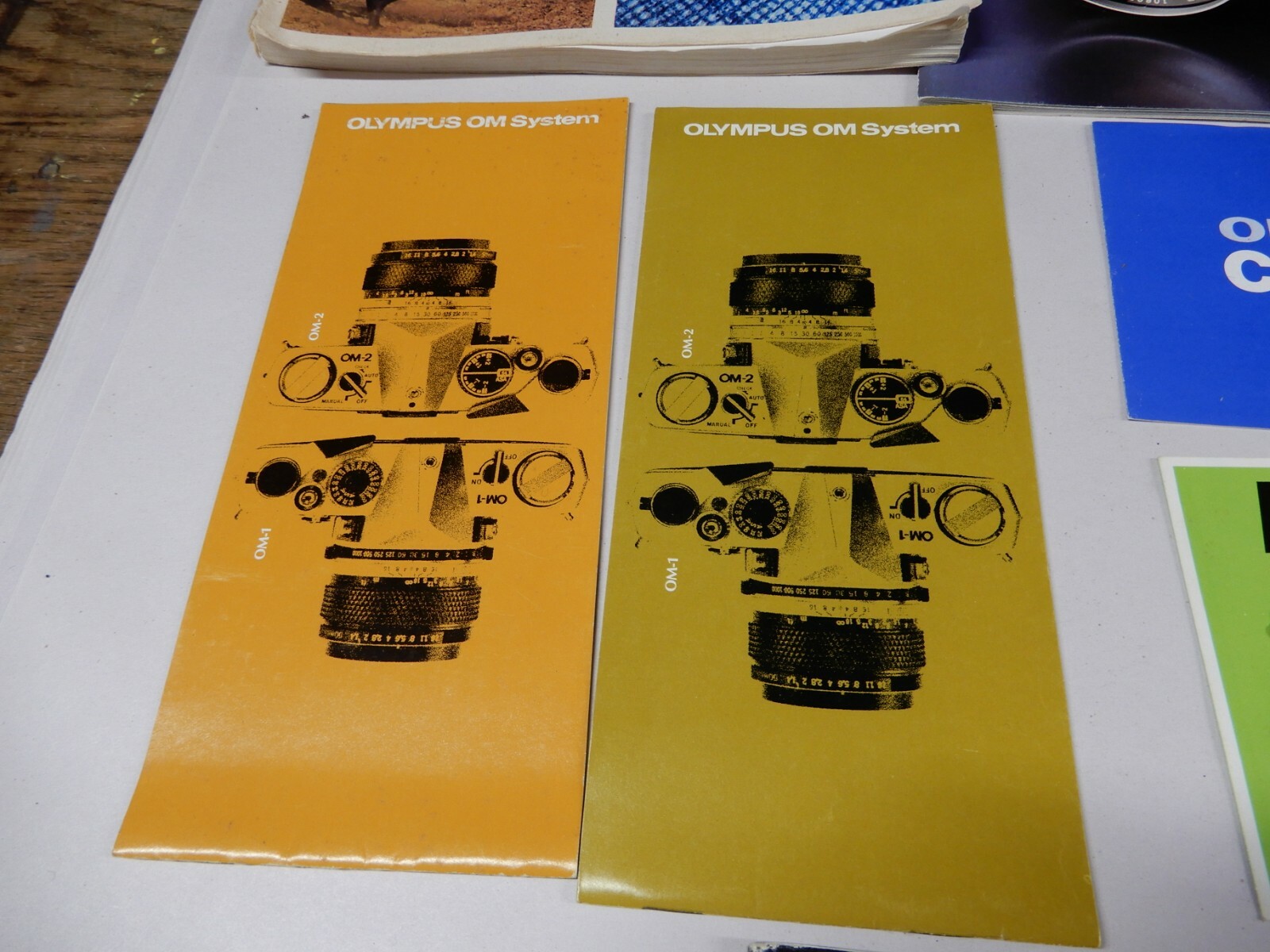 Olymous OM-2 Manual and Many Awesome OM System Sales Brochures