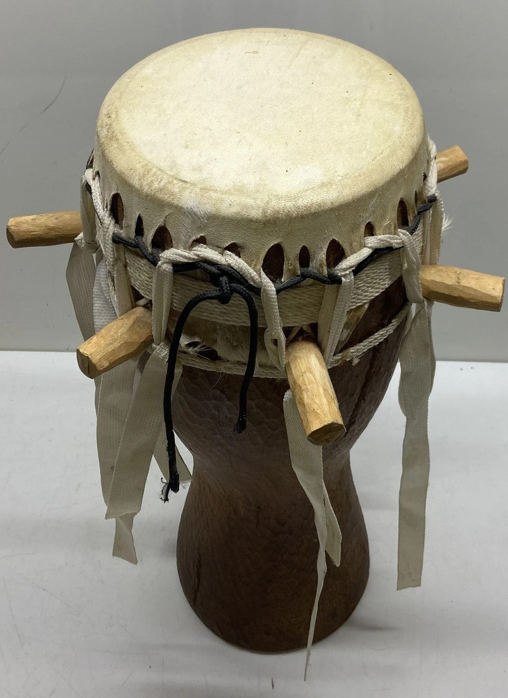 Wood and animal hide drum