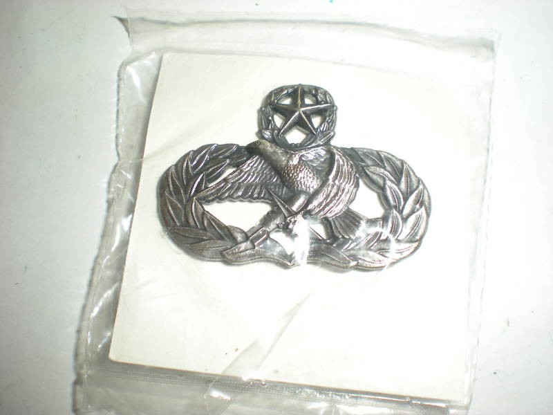 USAF ACFT MUNITIONS 9 LEVEL BADGE -SILVER OXIDIZED