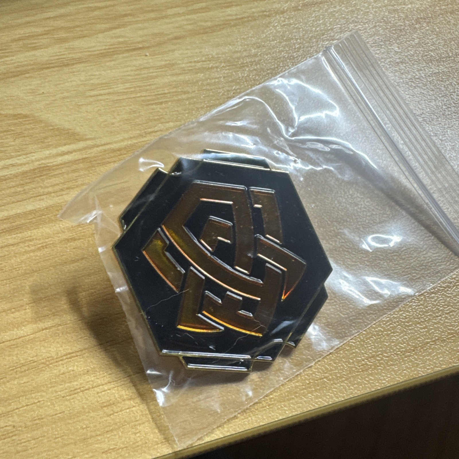 Lorcana Archazia's Island Amber Ink Logo Pin - League Exclusive