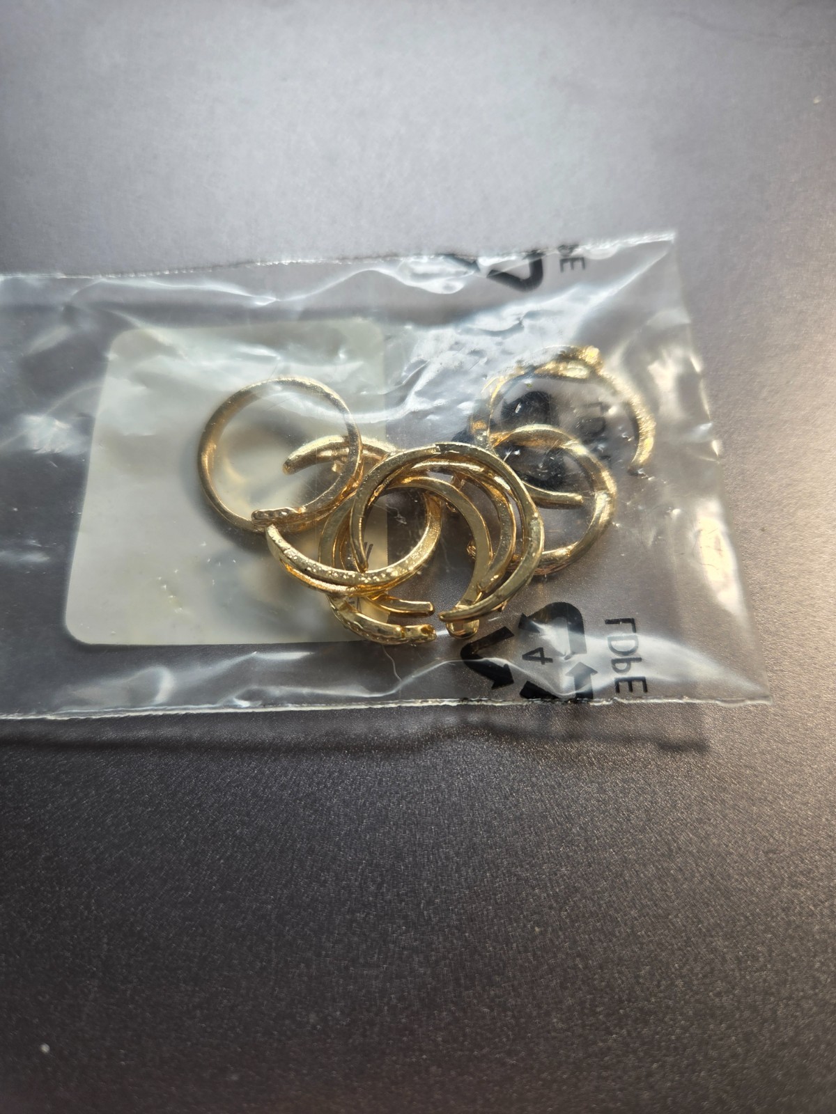 LOT OF 6 GOLD TONED TOE RINGS MISC DESIGNS