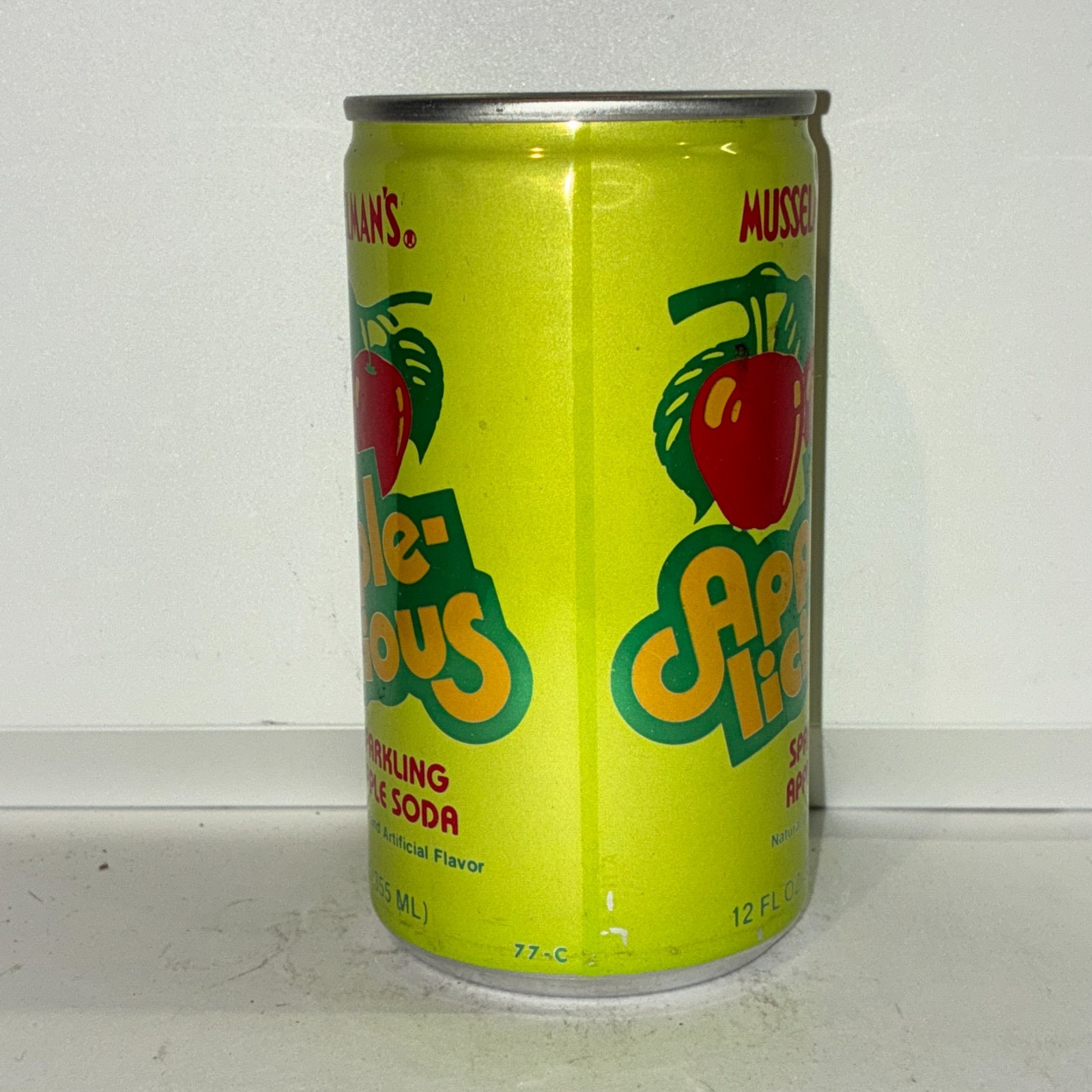 Musselman's Apple-licious Apple soda can, bottom opened