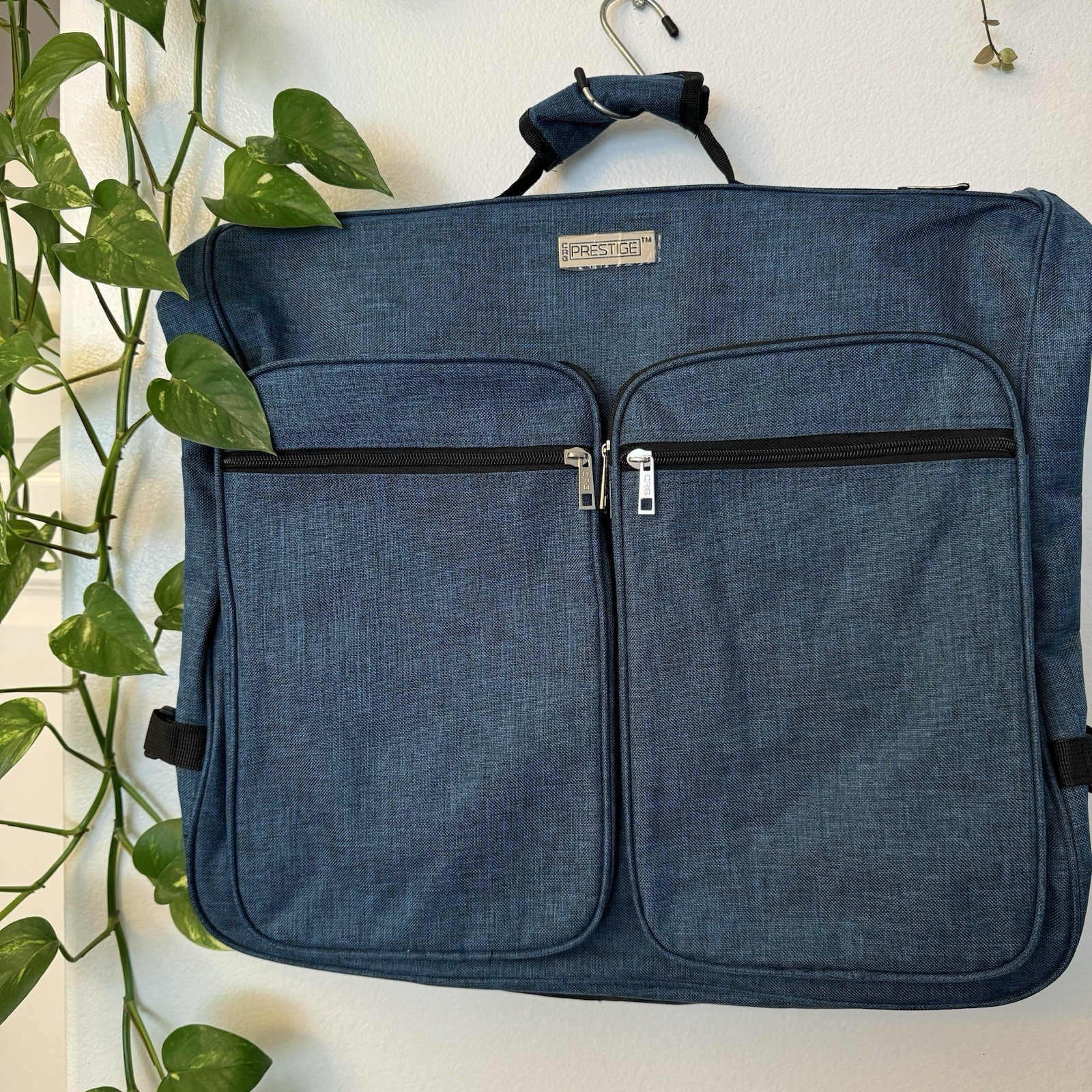 Prestige Foldable Garment Blue Bag with Multiple Zipper Pockets.