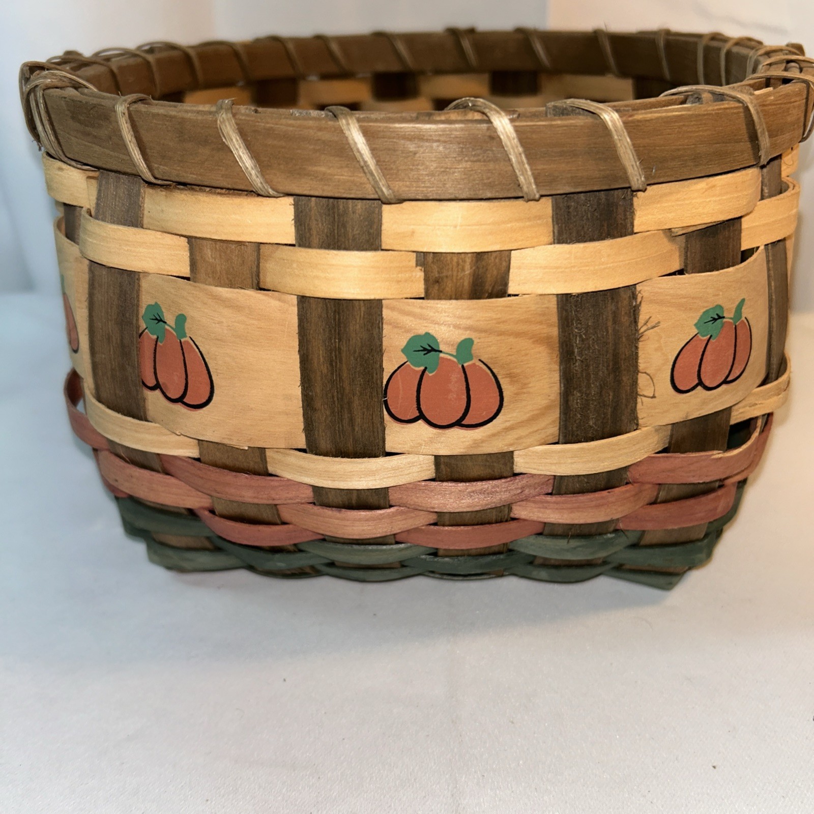 9 1/8” x 9 1/2” x 6” Basket With Painted Pumpkins On It
