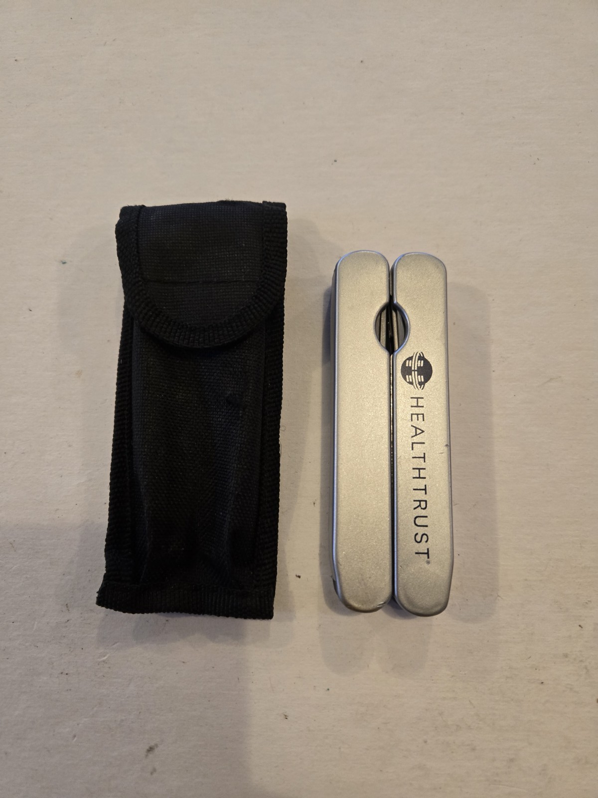 Unmarked Multi Tool, Silver with Sheath Advertising Healthtrust