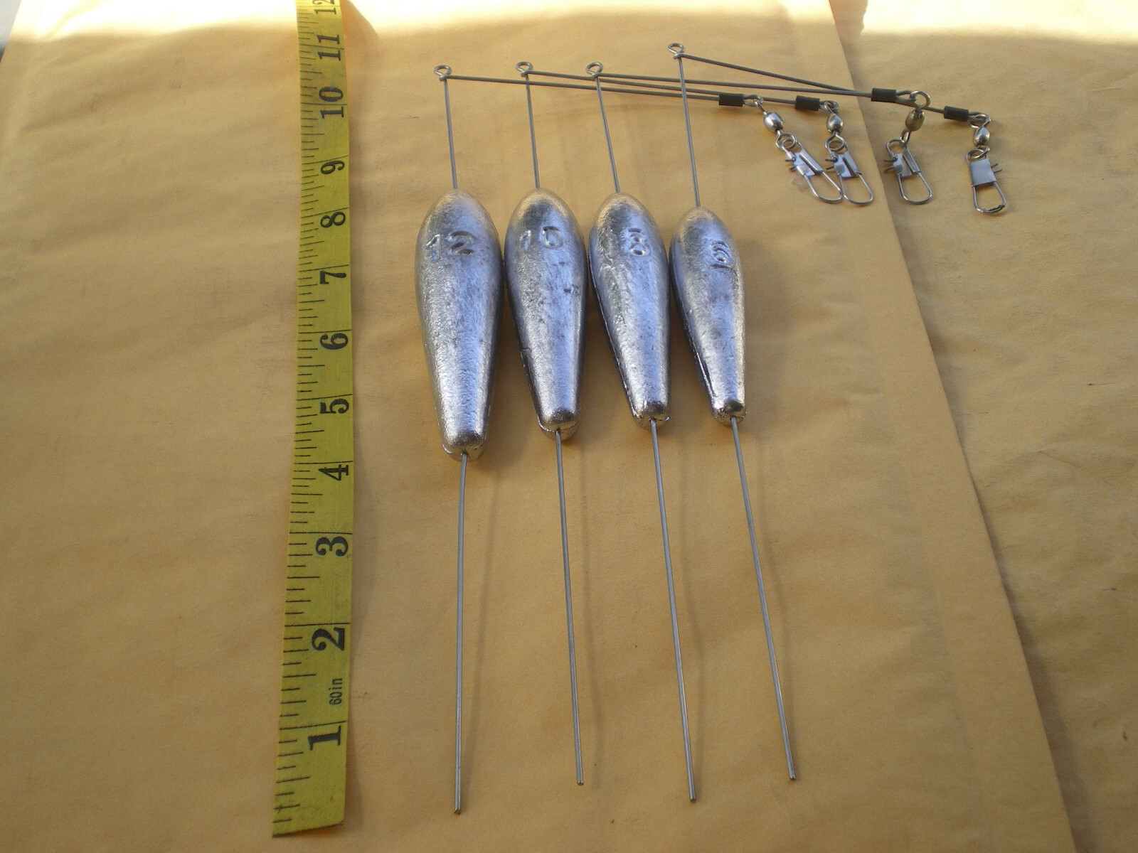 4 PCS. BOTTOM BOUNCER SINKER 12, 10, 8, 6 OZ. S.S. WIRE 051X11"LEG X 4"ARM 1ea.