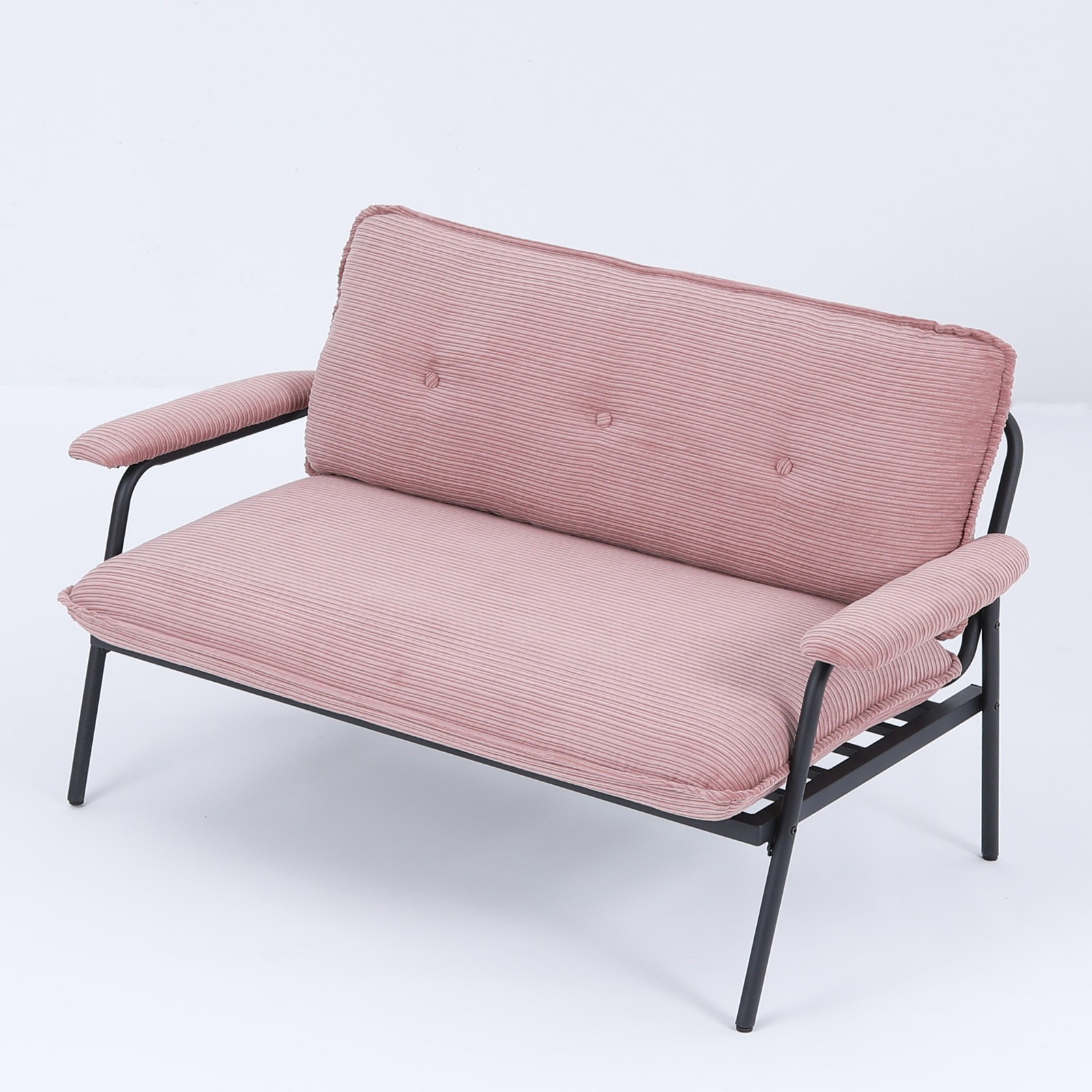 The 53-inch pink sofa offers a spacious layout in the small apartment, easily