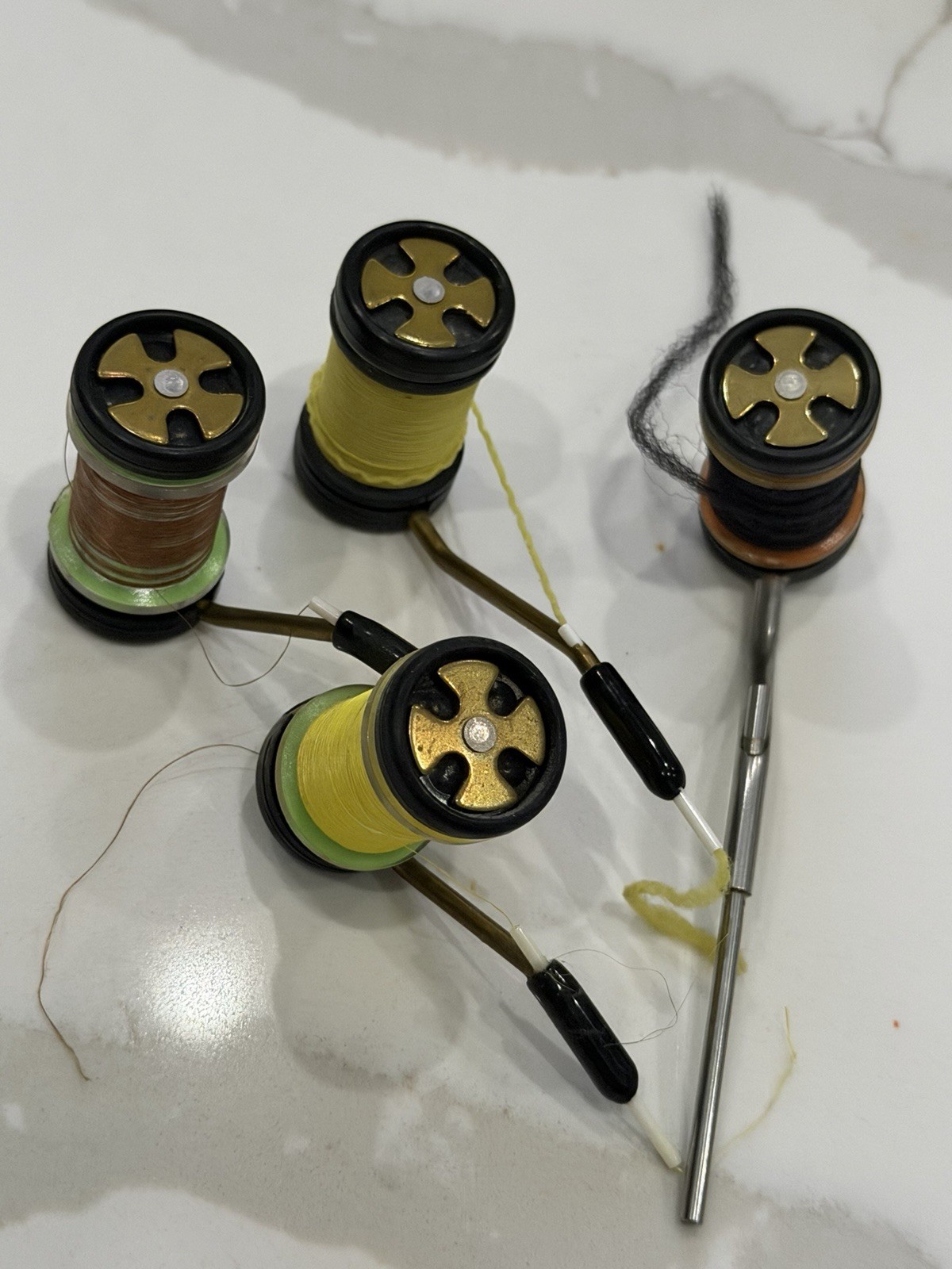 Rite Bobbins, which are specialized adjustable-tension bobbins