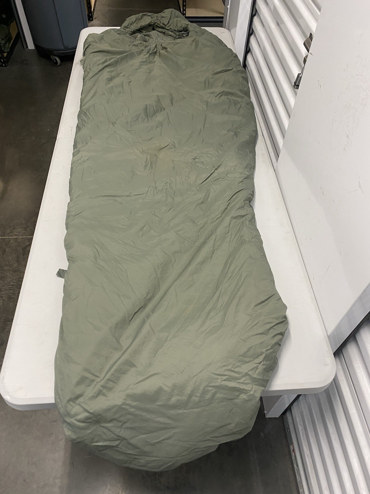 Damaged USGI Foilage Green Patrol Sleeping Bag