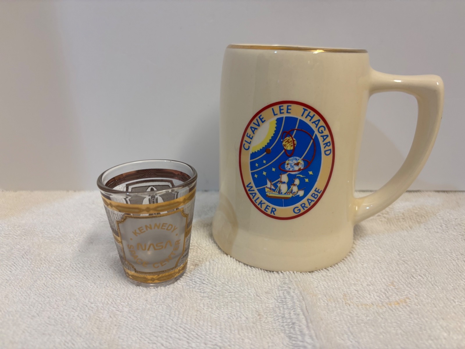 NASA mug and Kennedy shot glass