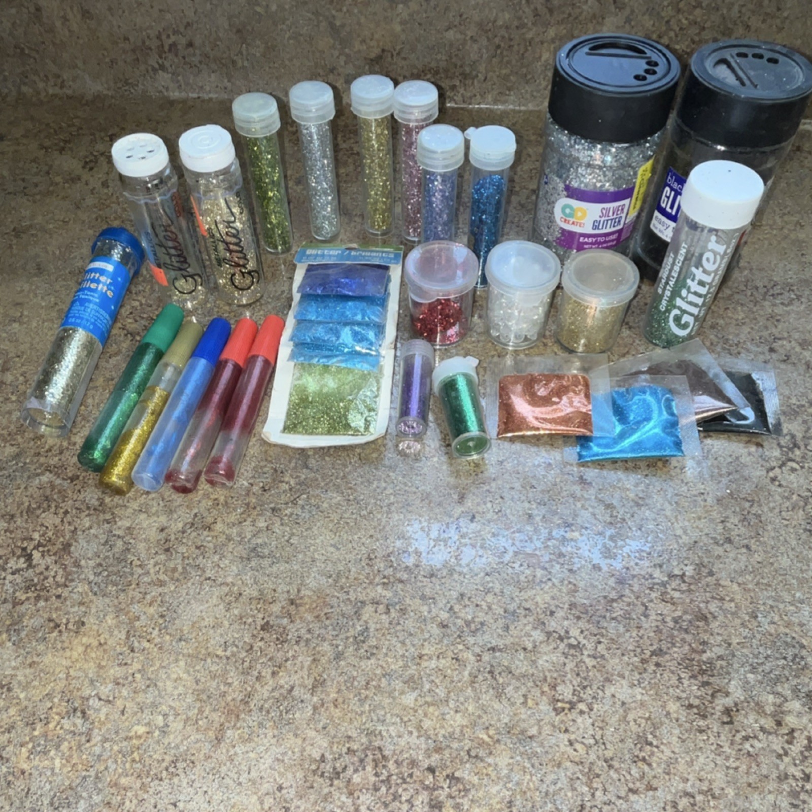 Lot of glitter used new, multicolored lot of 23 random glitter for crafters