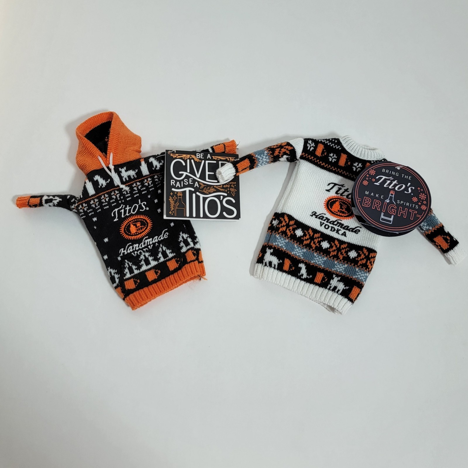 2 Tito’s Handmade Vodka Bottle Ugly Sweater Bottle Cover Black, Orange and white