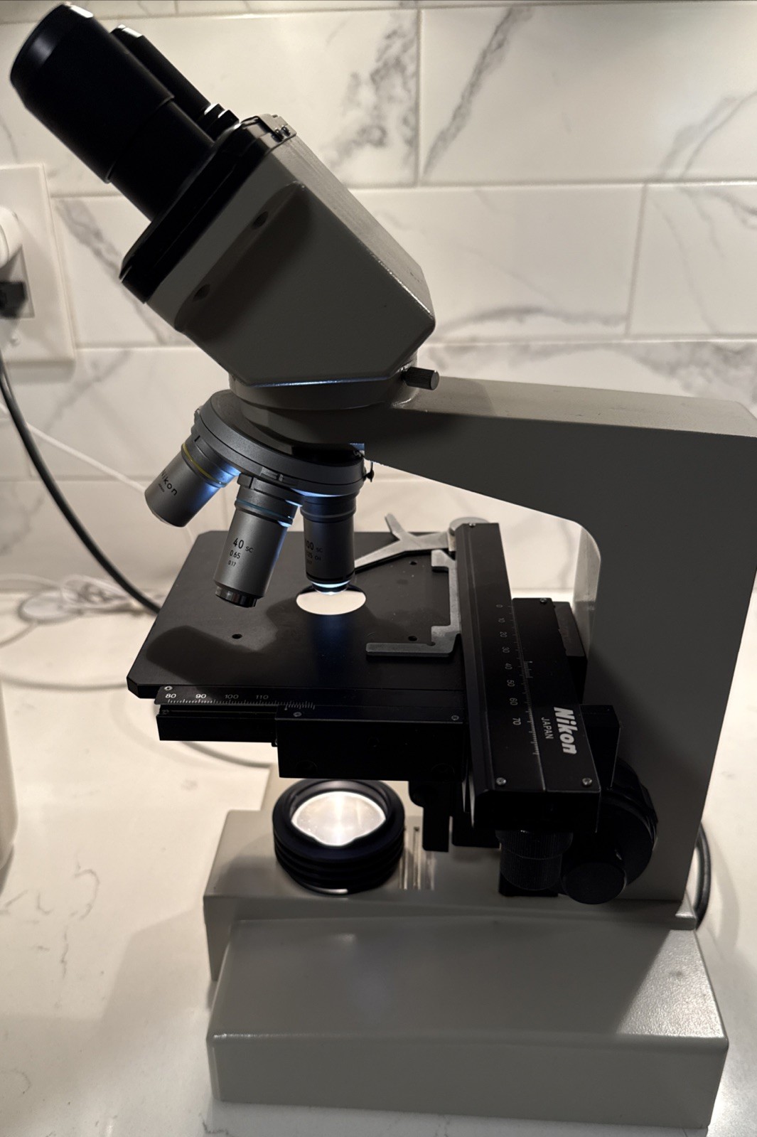 Nikon Model SC Binocular Microscope With Carry Case