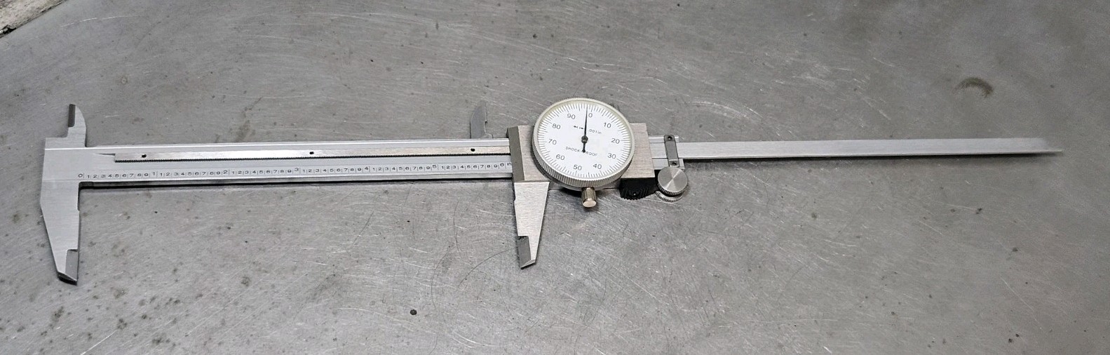 Starrett No. 657AA magnetic base + 1" dial indicator - micrometer - caliper