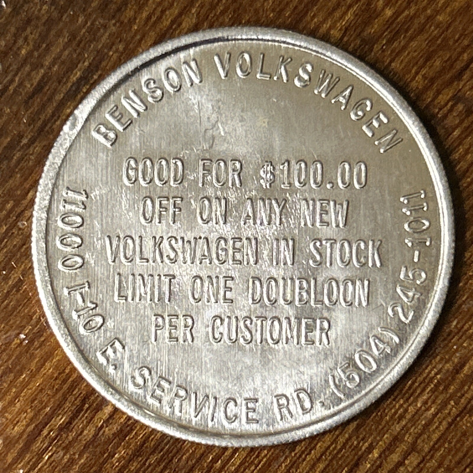 Benson Volkswagen $100 Off New Vehicle Aluminum Doubloon - New Orleans Skyline