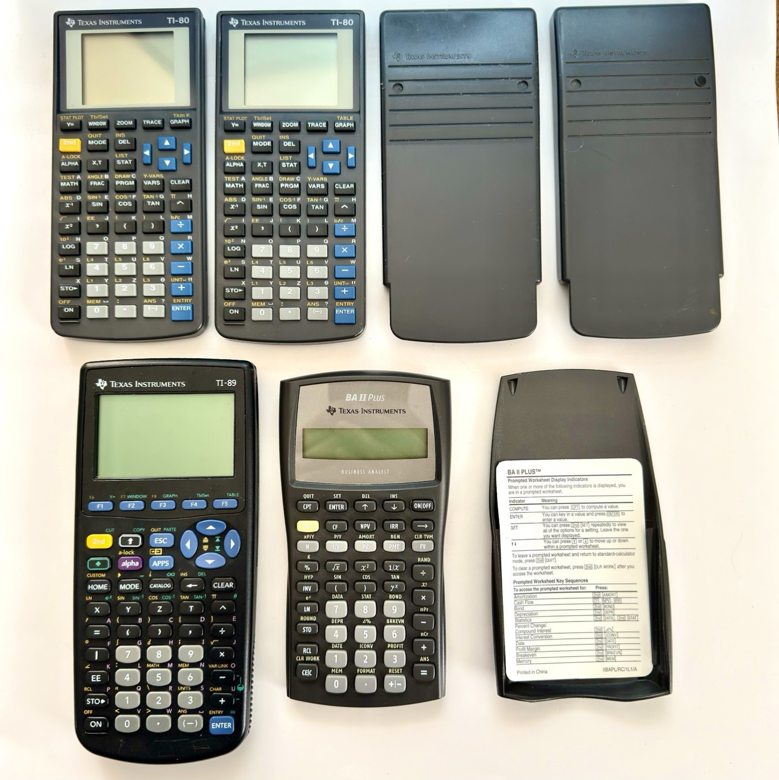 Texas Instruments Lot Of 4 Calculators Nonworking For Parts Ti-89 TI-80 BA II
