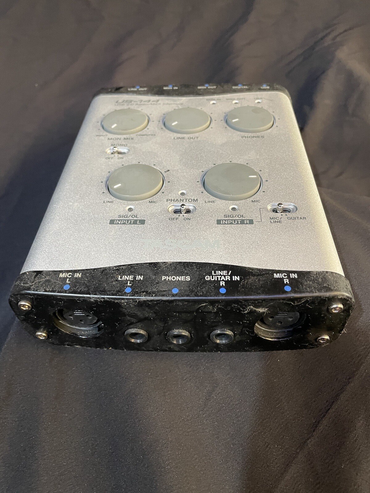 Tascam US-144. USB audio interface. works great.