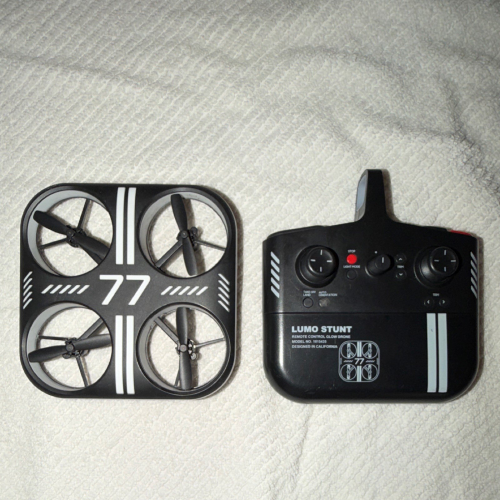 Sharper Image Lumo Stunt Glow Drone Quadcopter with LED Lights & Controller