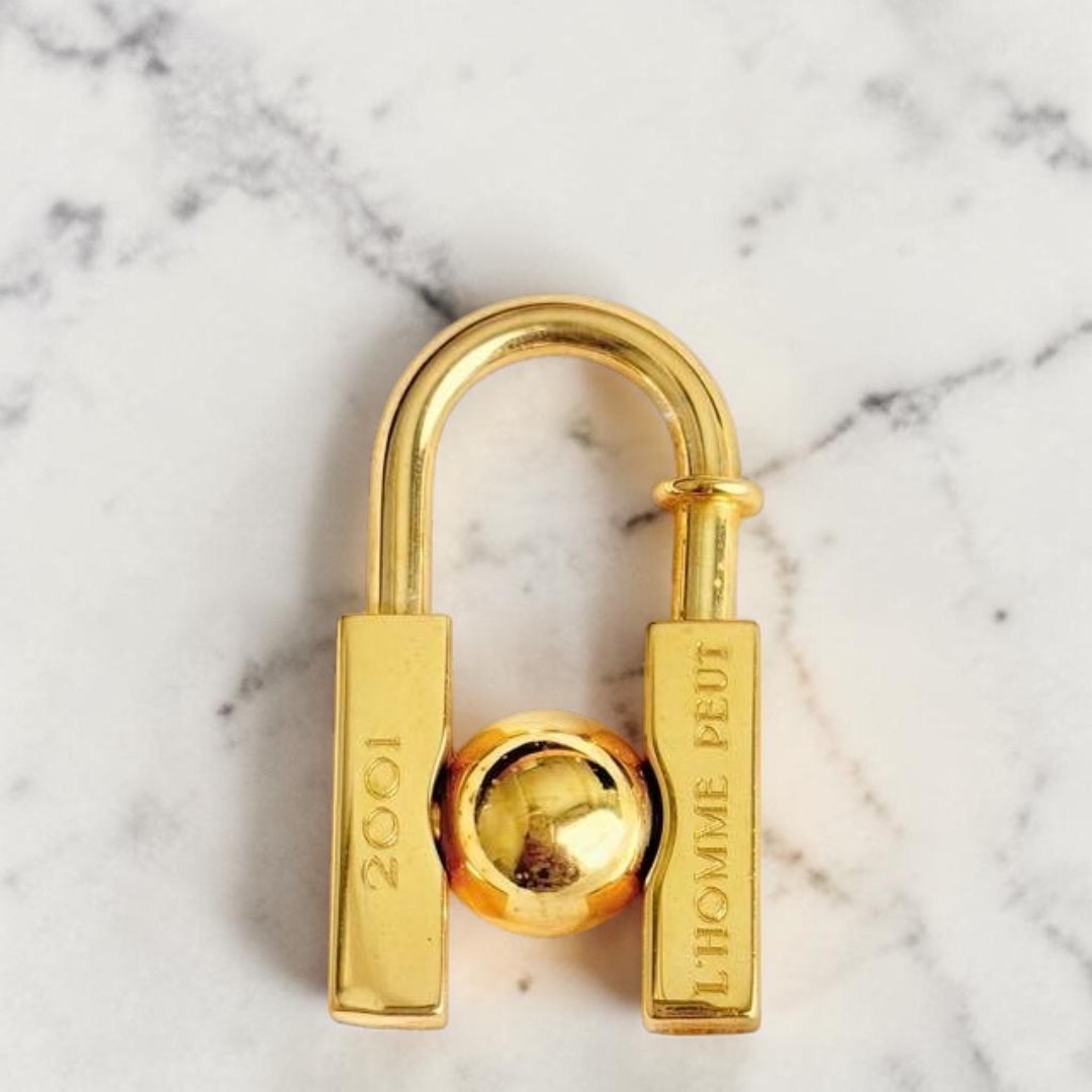 Hermès Cadena Earth 2001 Gold Color Lock Charm