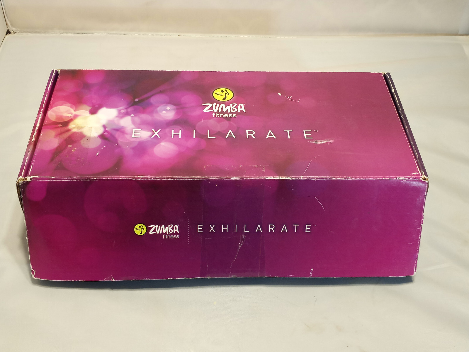 Zumba Fitness Exhilarate Body Shaping System 4 DVD Set & Toning Sticks