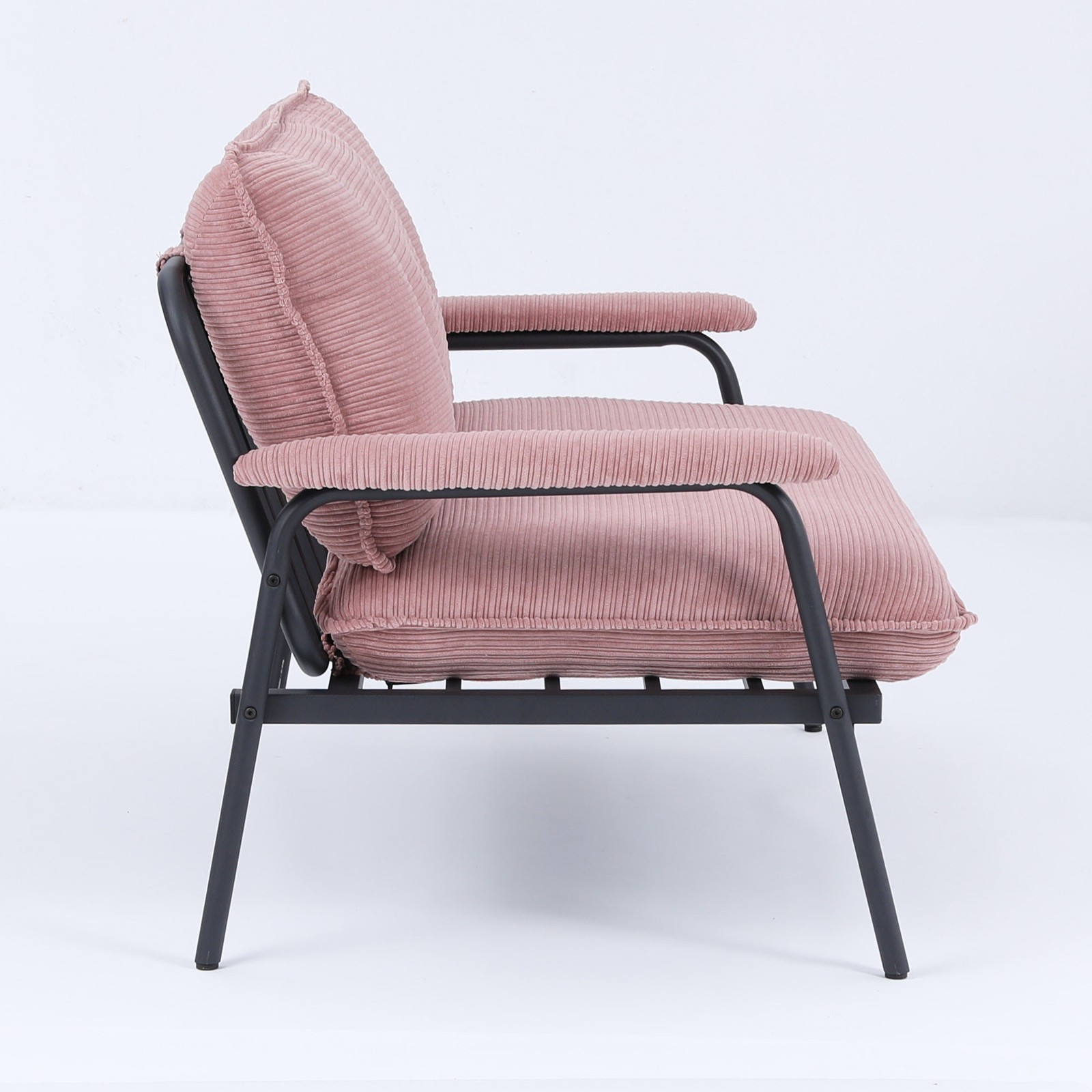 The 53-inch pink sofa offers a spacious layout in the small apartment, easily
