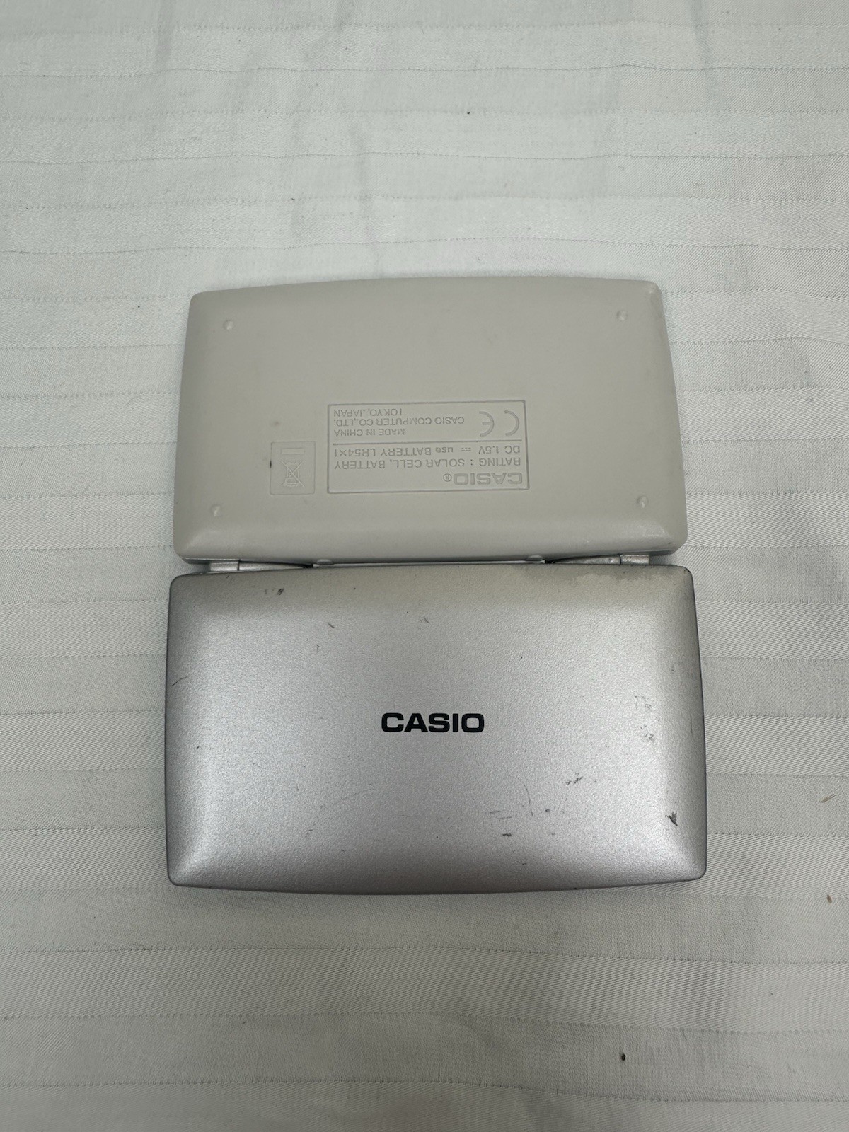 CASIO SL-100L BASIC SOLAR FOLDING COMPACT CALCULATOR