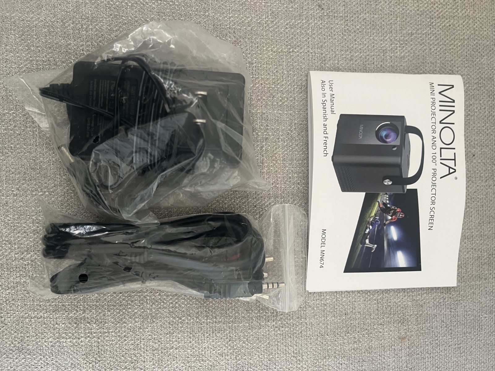 Minolta Mini Projector Bundle 1080P HD w/ 100" Screen, Remote, HDMI/USB/Micro-SD