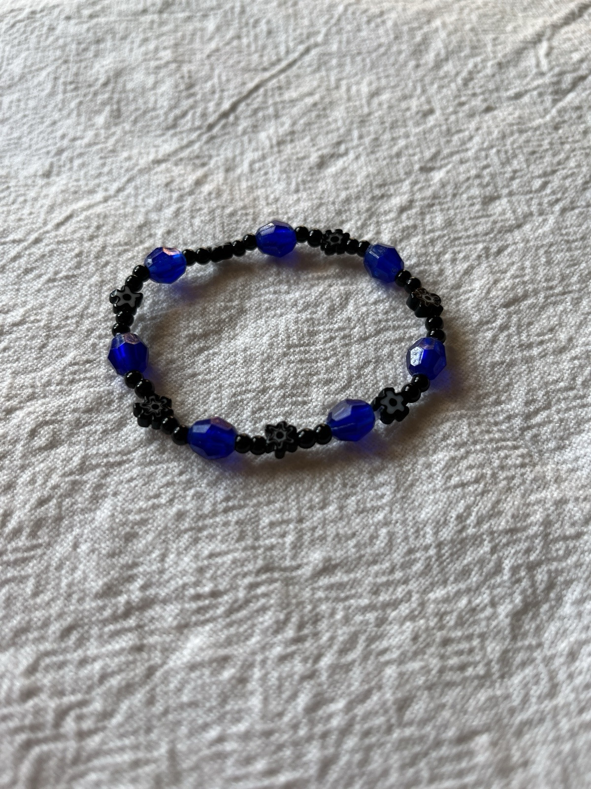 Handmade Elastic Bracelet With Black Flower Beads & Black And Blue Beads