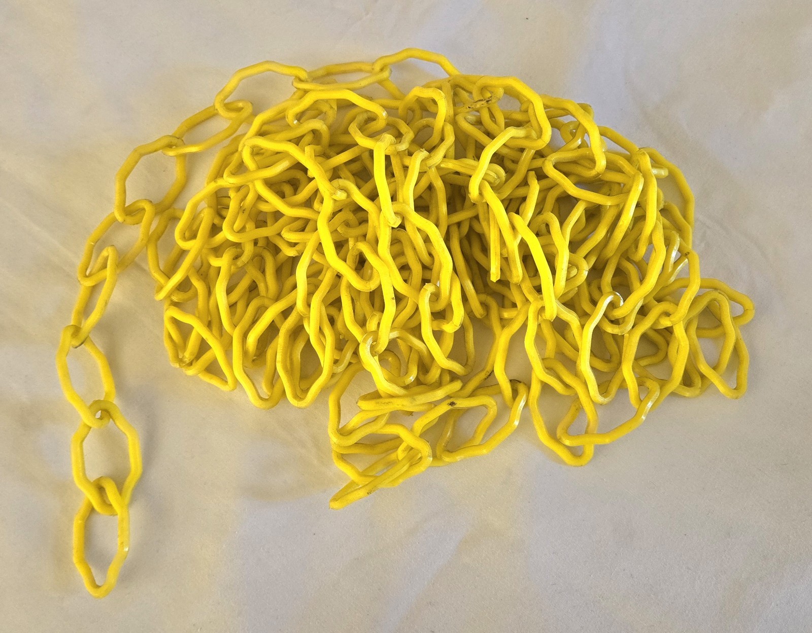 20 feet - Rubbermaid Yellow Plastic Chain Link Barrier FG618400YEL 6184