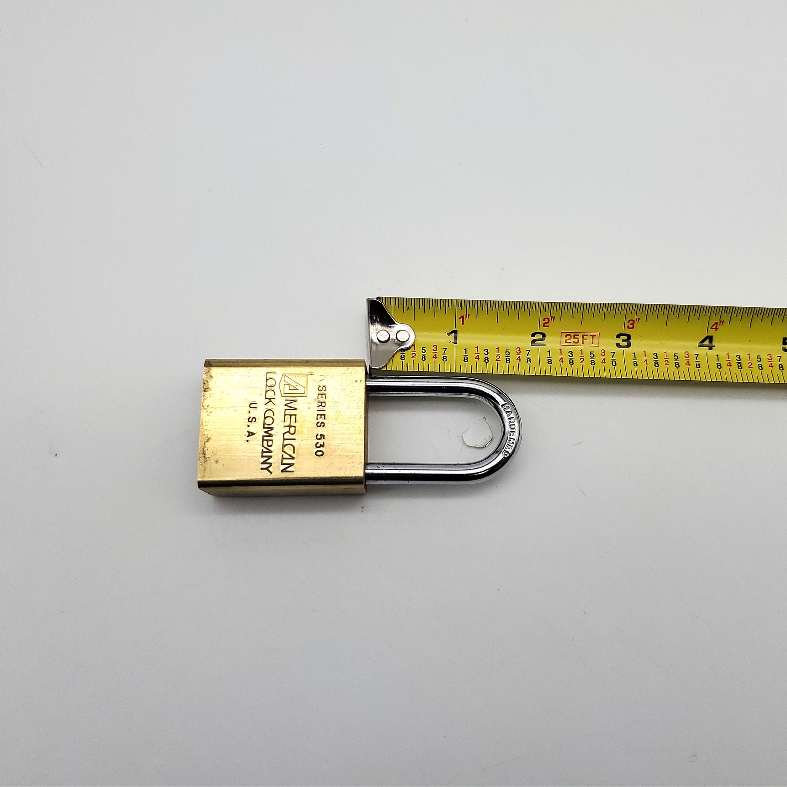 American 530 Padlock Rekeyable 1-5/8"L x 1/4"D Shackle 1-3/8" Brass Body No Core