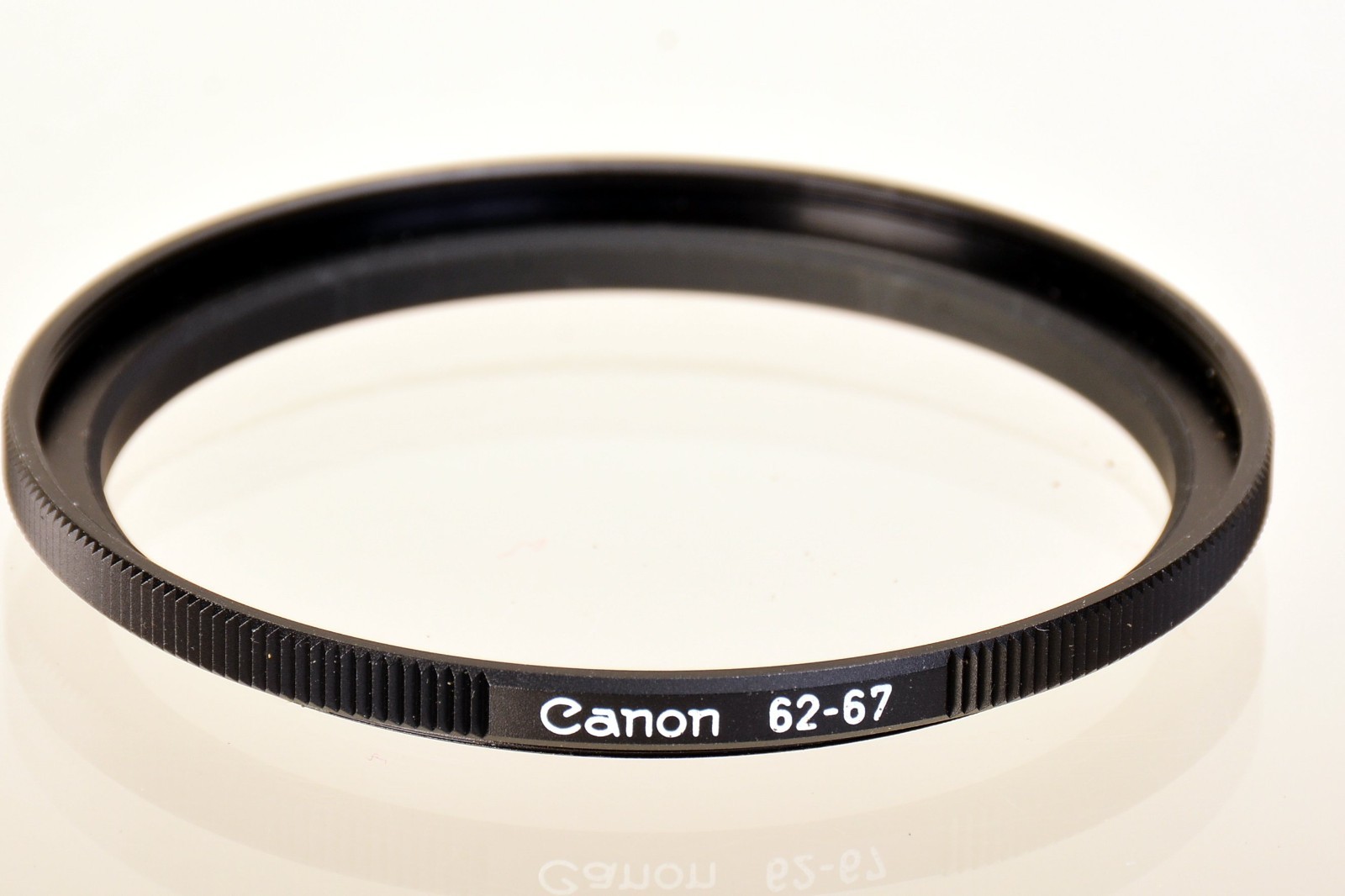 OEM Canon 62mm-67mm Step-Up Ring for adapting filters.  Mint.