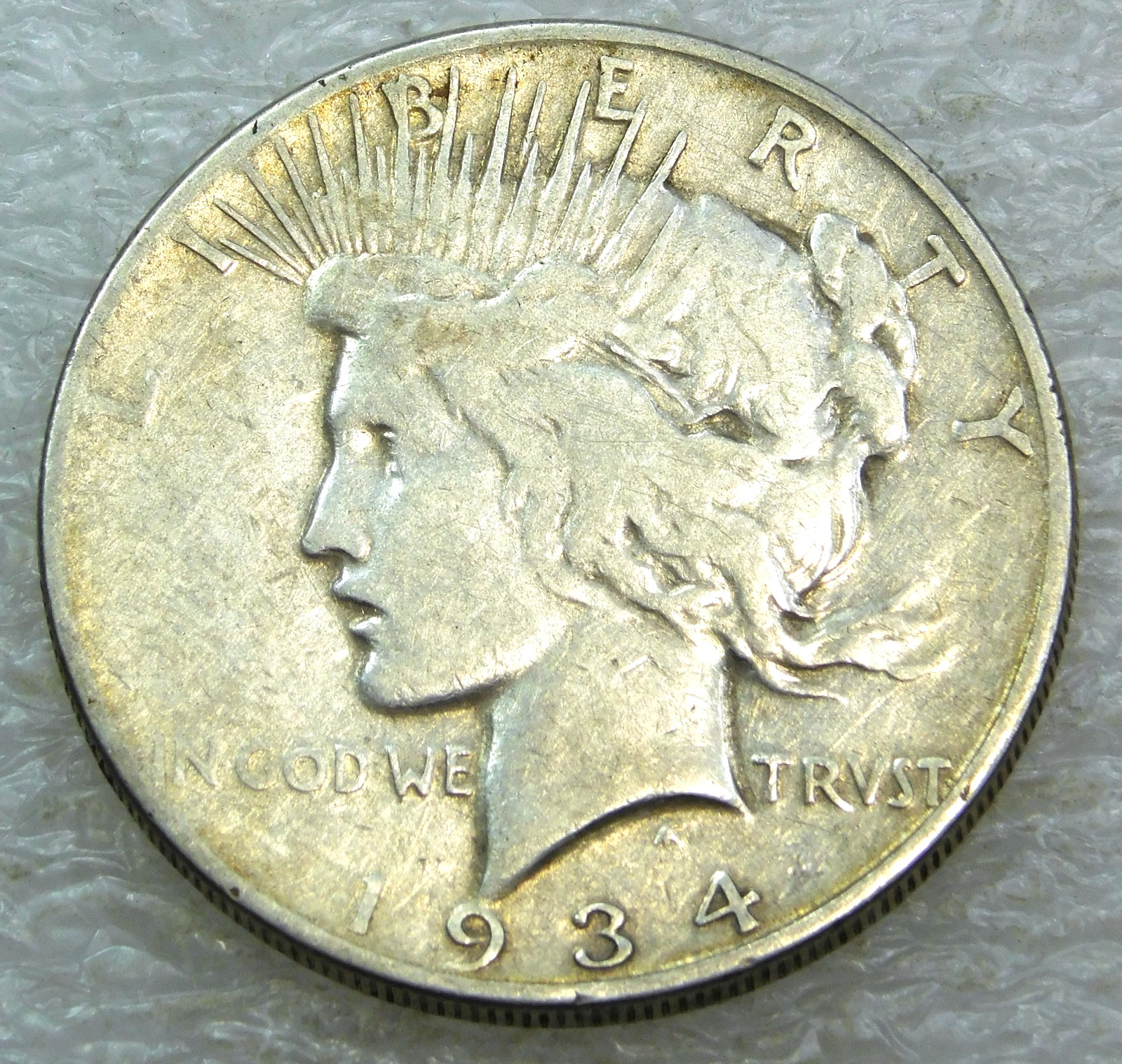 1934-S Peace Silver Dollar with Good Luster in saflip #S315