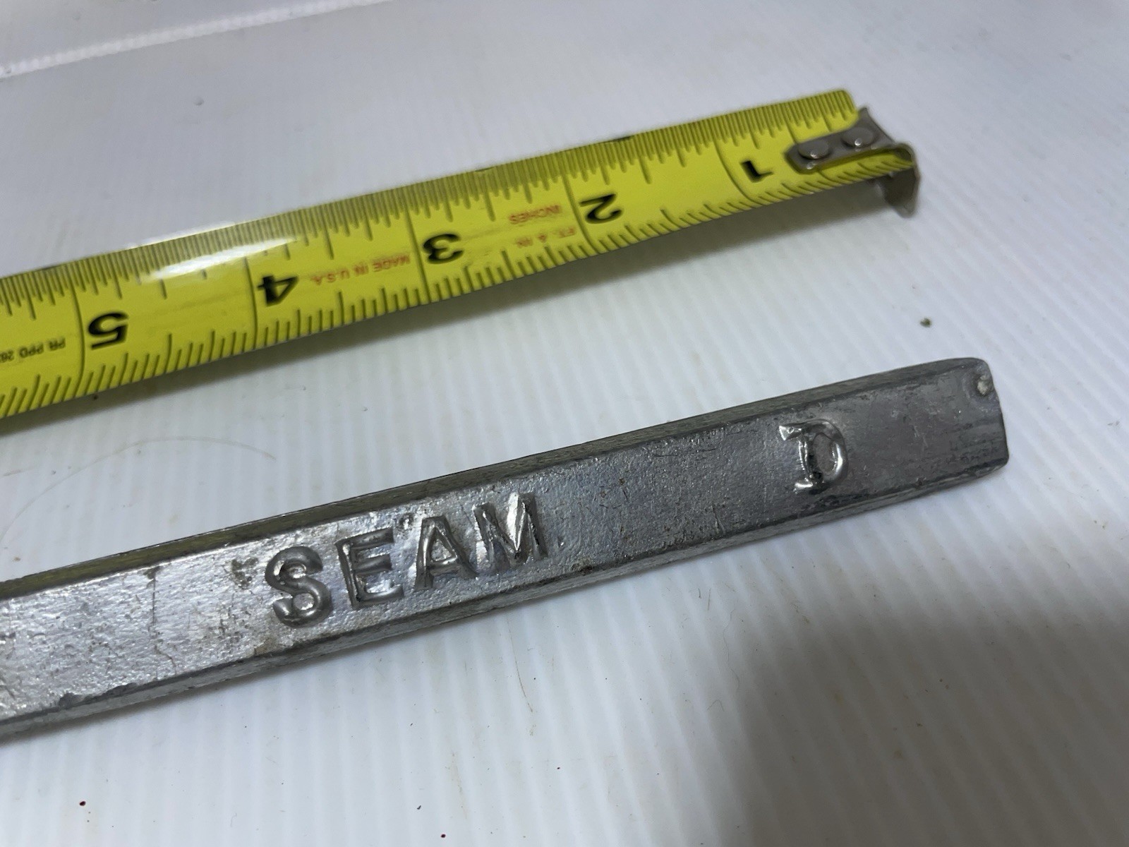 Vintage Bell System D Seam solder telephone cables in manholes