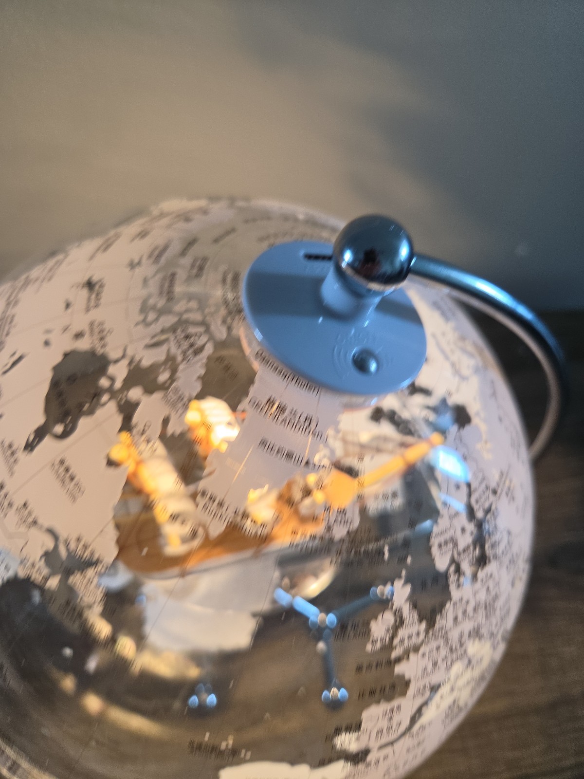 LED Illuminated Earth Globe War. White Light Metal Stand