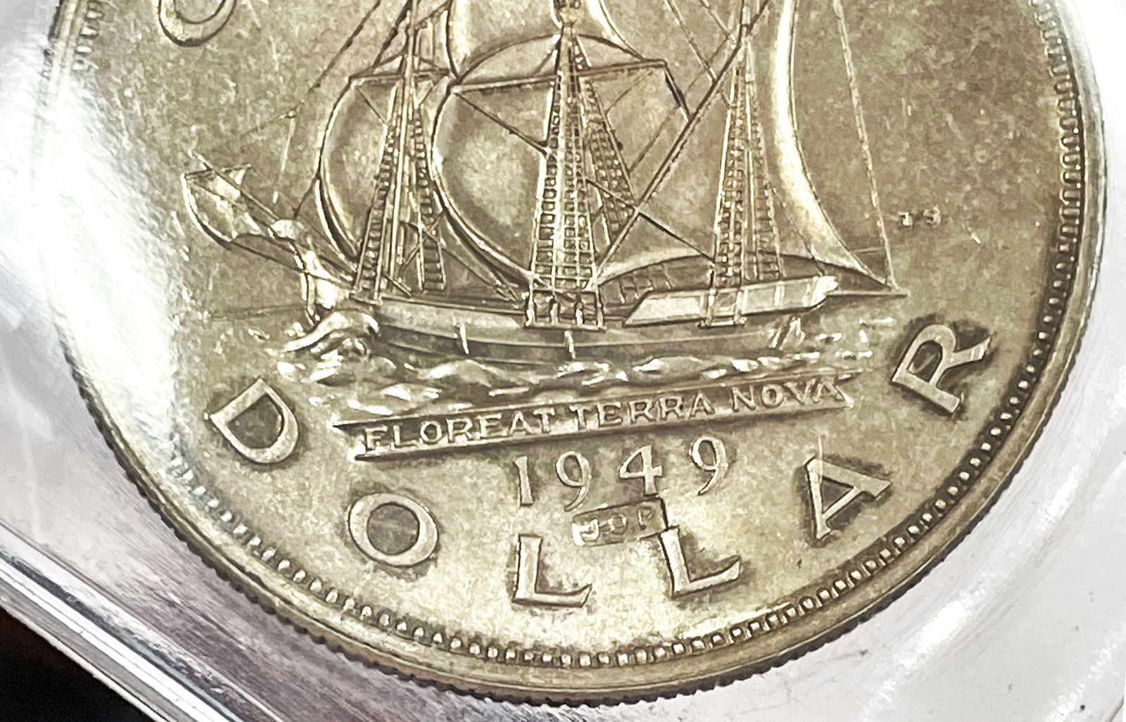 1949 SILVER CANADA J.O.P RARE COUNTERMARKED $1 JOSEPH OLIVA PATENAUDE ICCS MS64
