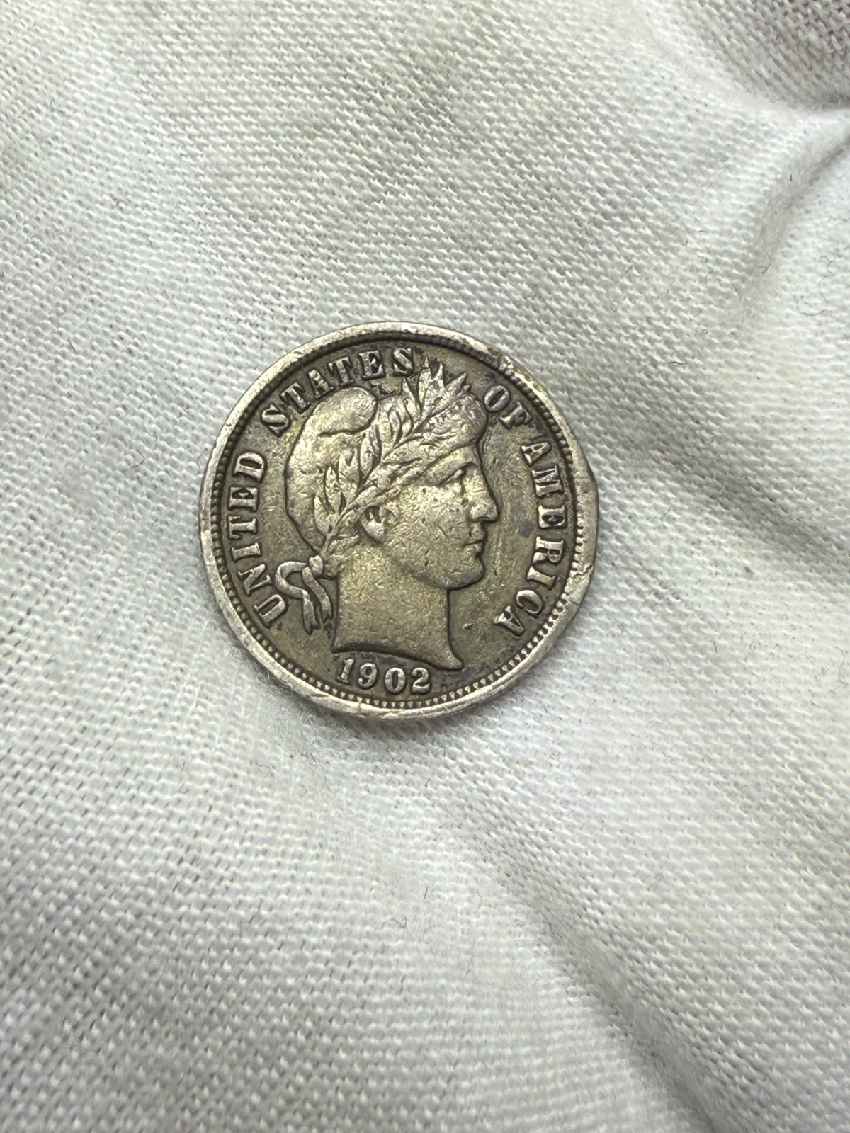1902 O Barber Dime 10c Better Grade XF Reverse Cud T110