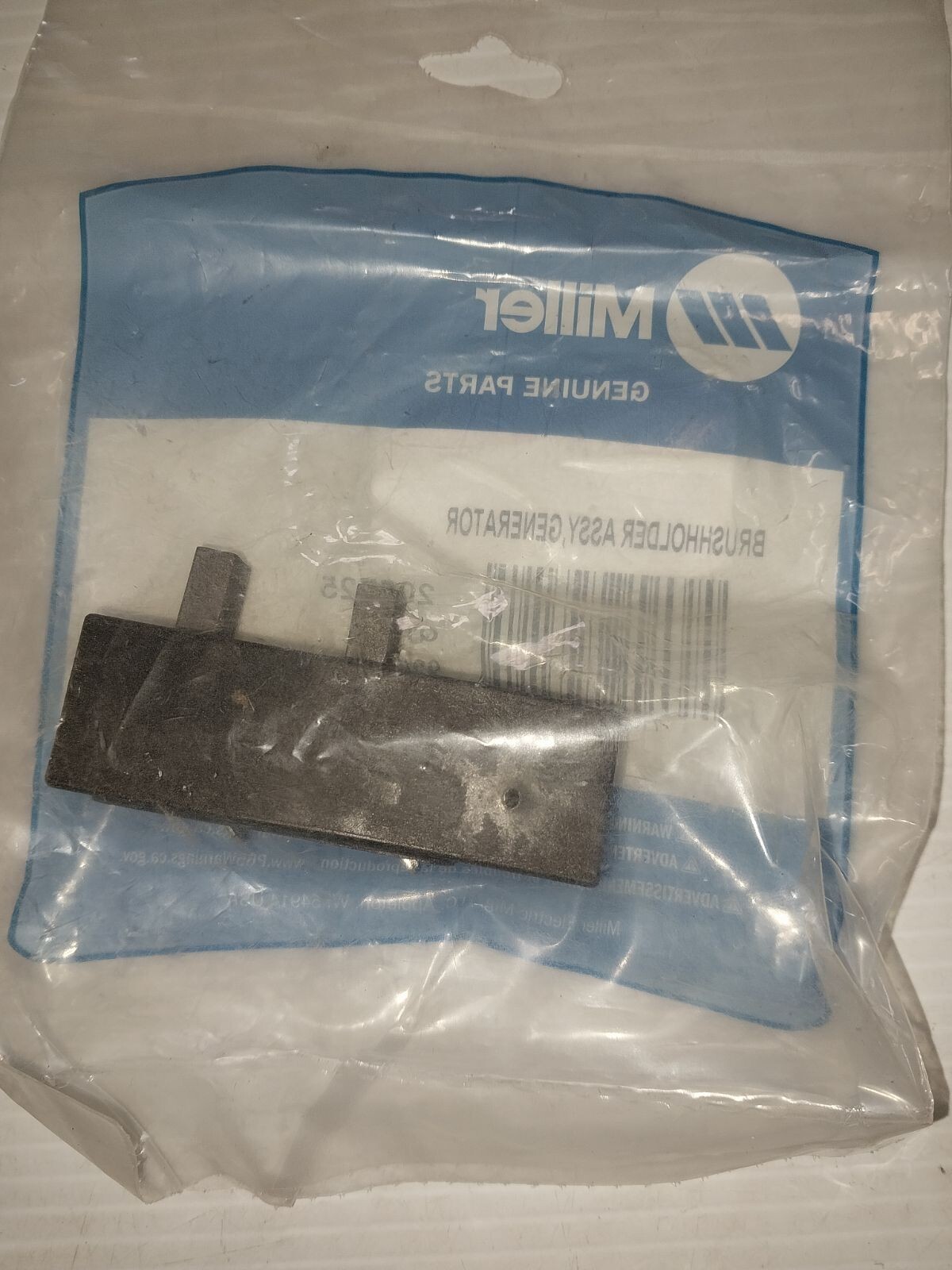 MILLER BRUSH HOLDER ASSY, GENERATOR205725