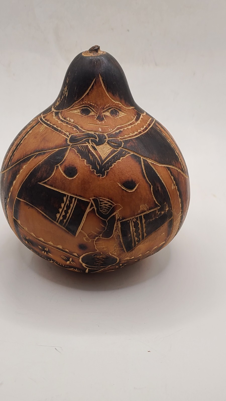 Gourd Peruvian Folk Art hand painted. Women w braided hair holding toy. Vintage