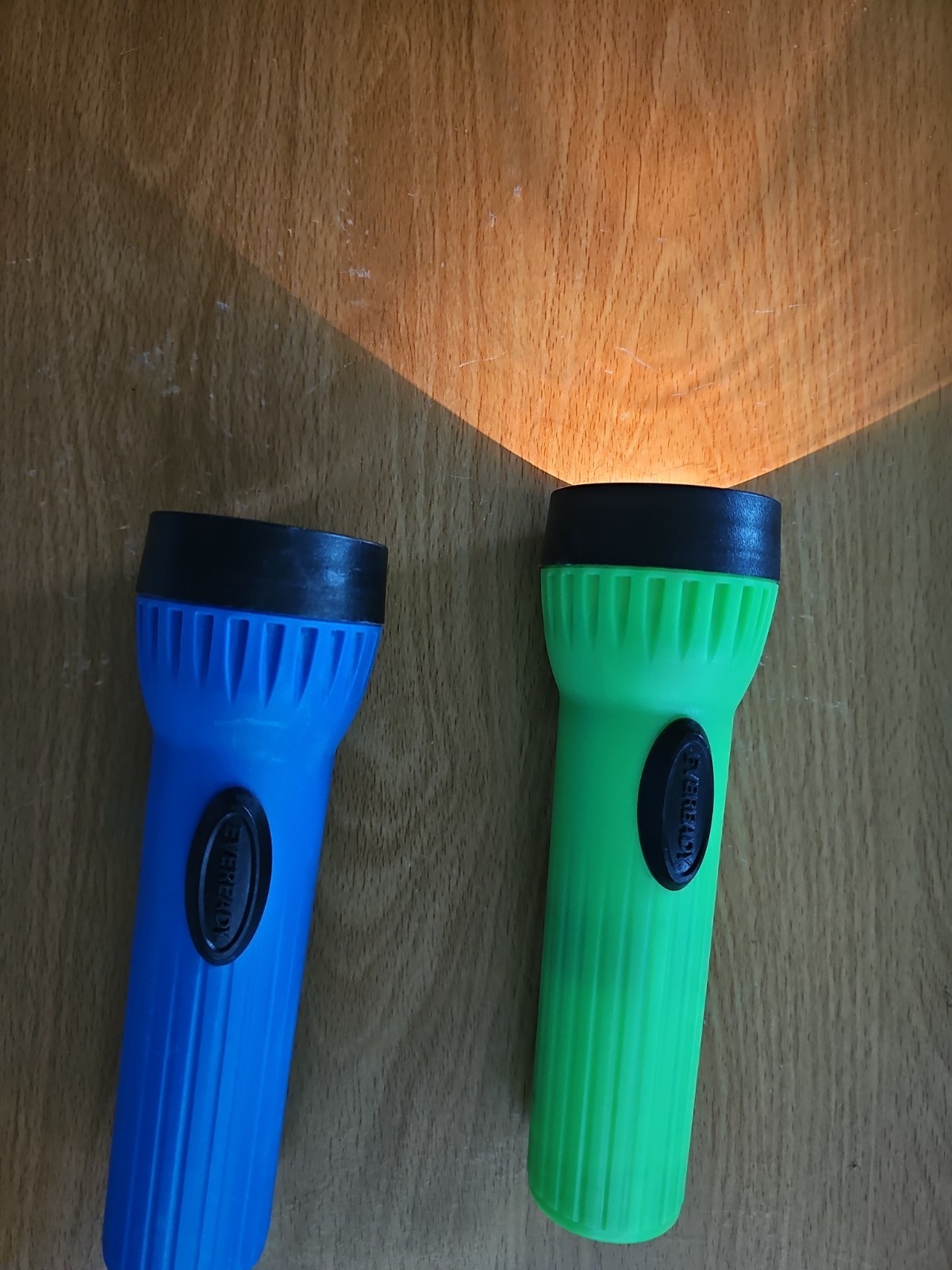 Eveready Plastic Flashlight Regular Light Uses 2D Battery 2 Count Green Blue