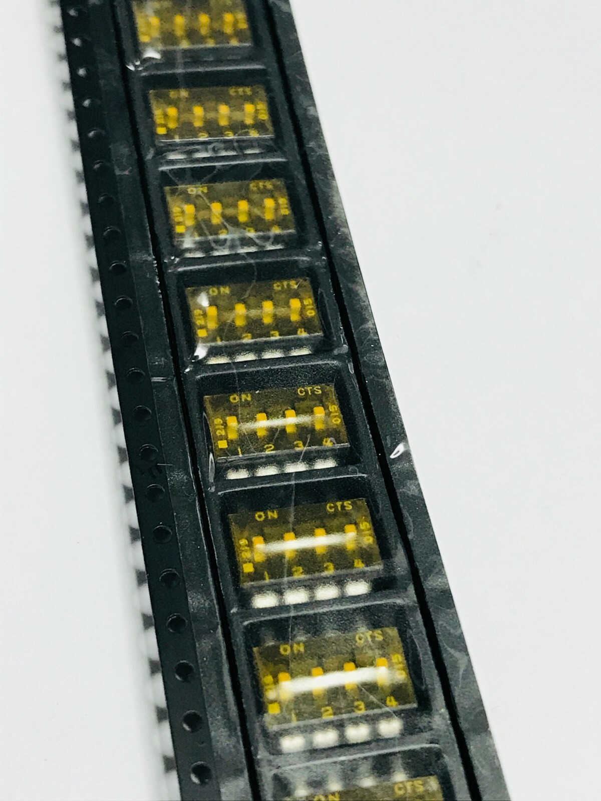 25pcs Lot of 219-4MSTR  Slide Dip Switch 4 Switches SPST 0.1A 20VDC Latched SMD